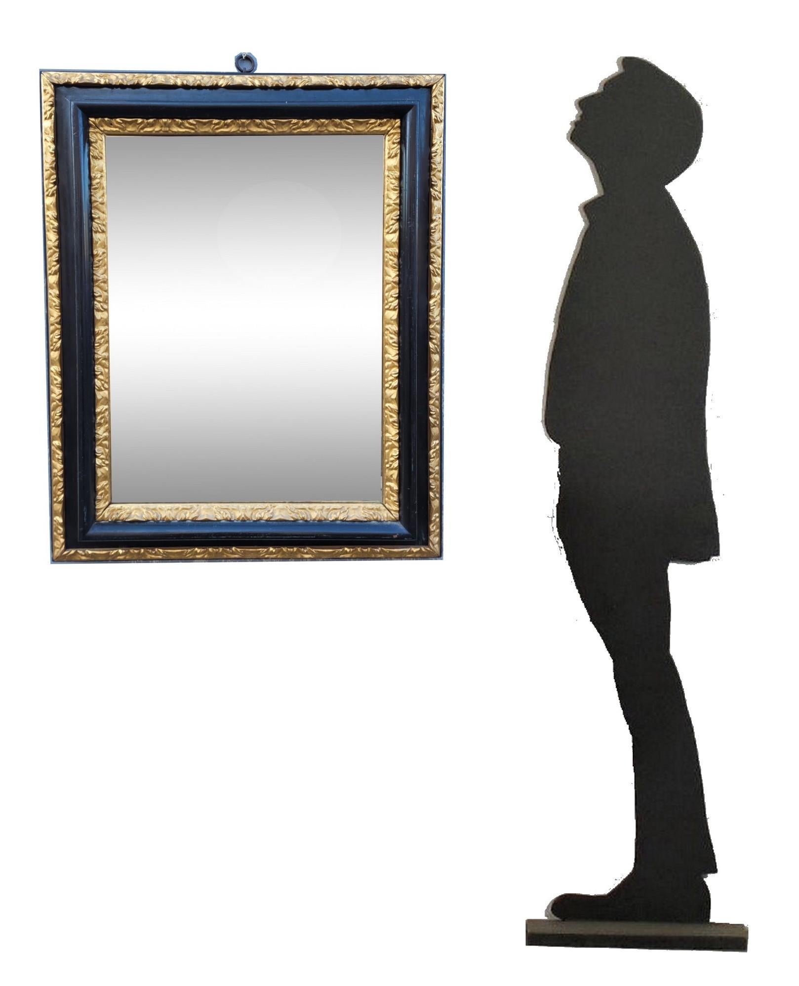 Large mirror in blackened wood with gilded rods, Louis XIV period, but reworked in the 19th century

Wear of time on the wood, wear on the mirror's tin

Height 98 cm
79 x 9 cm