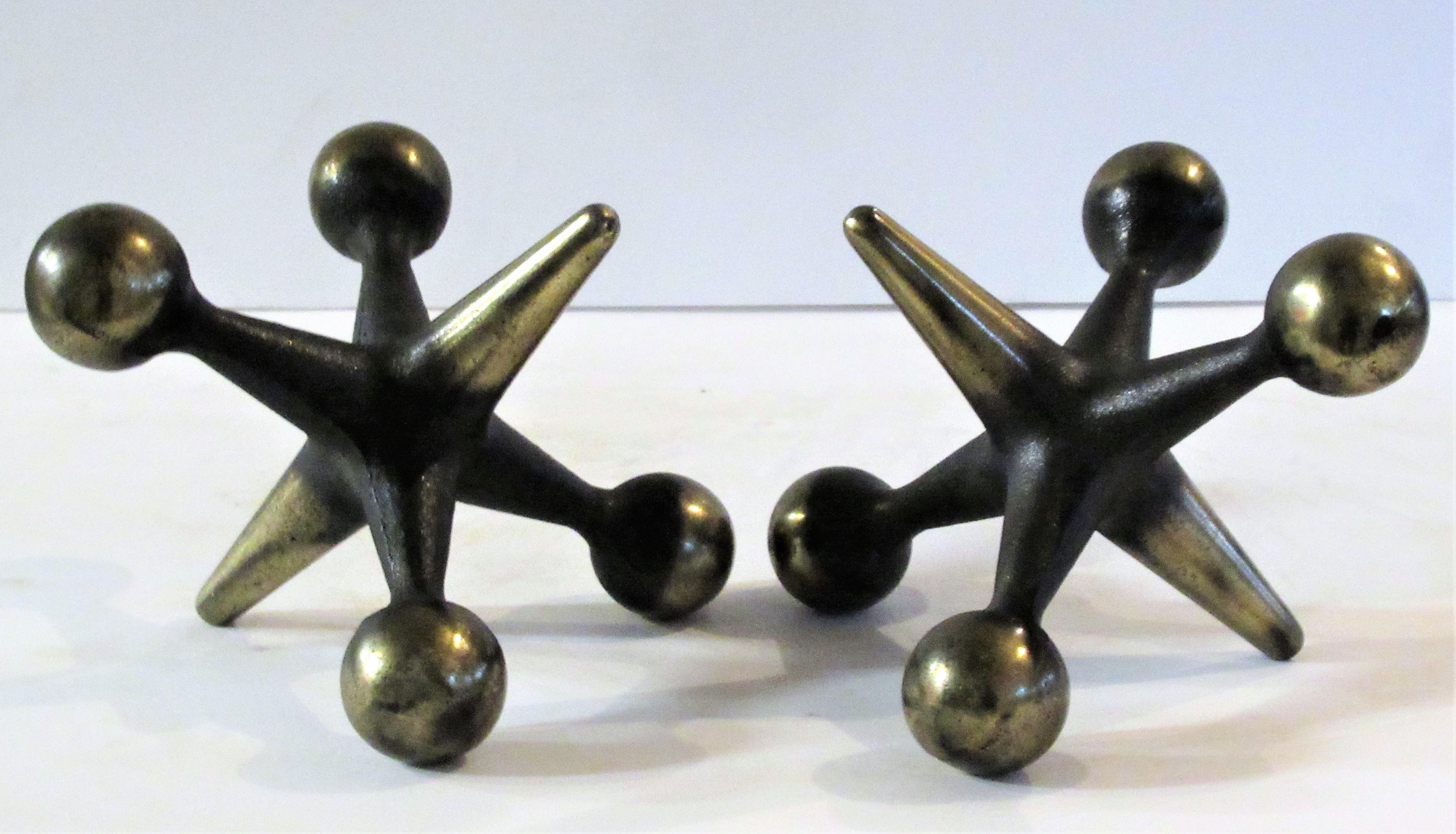 Vintage pair of Bill Curry Design Line jacks bookend sculptures in beautifully aged original plated brass and blackened iron surface, circa 1960's. Look at all pictures and read condition report in comment section.