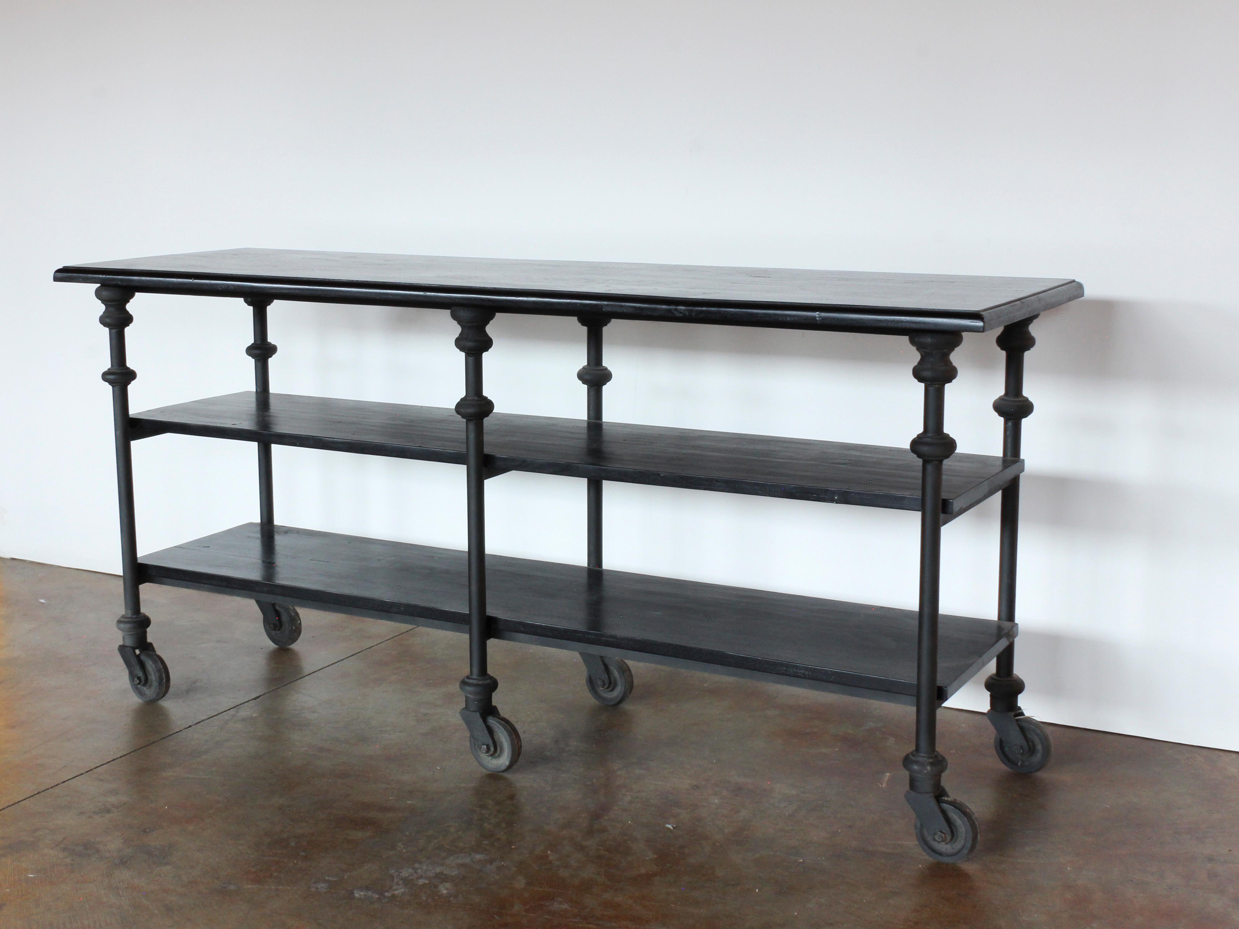 20th Century Blackened Iron and Wood Shelving Island on Casters
