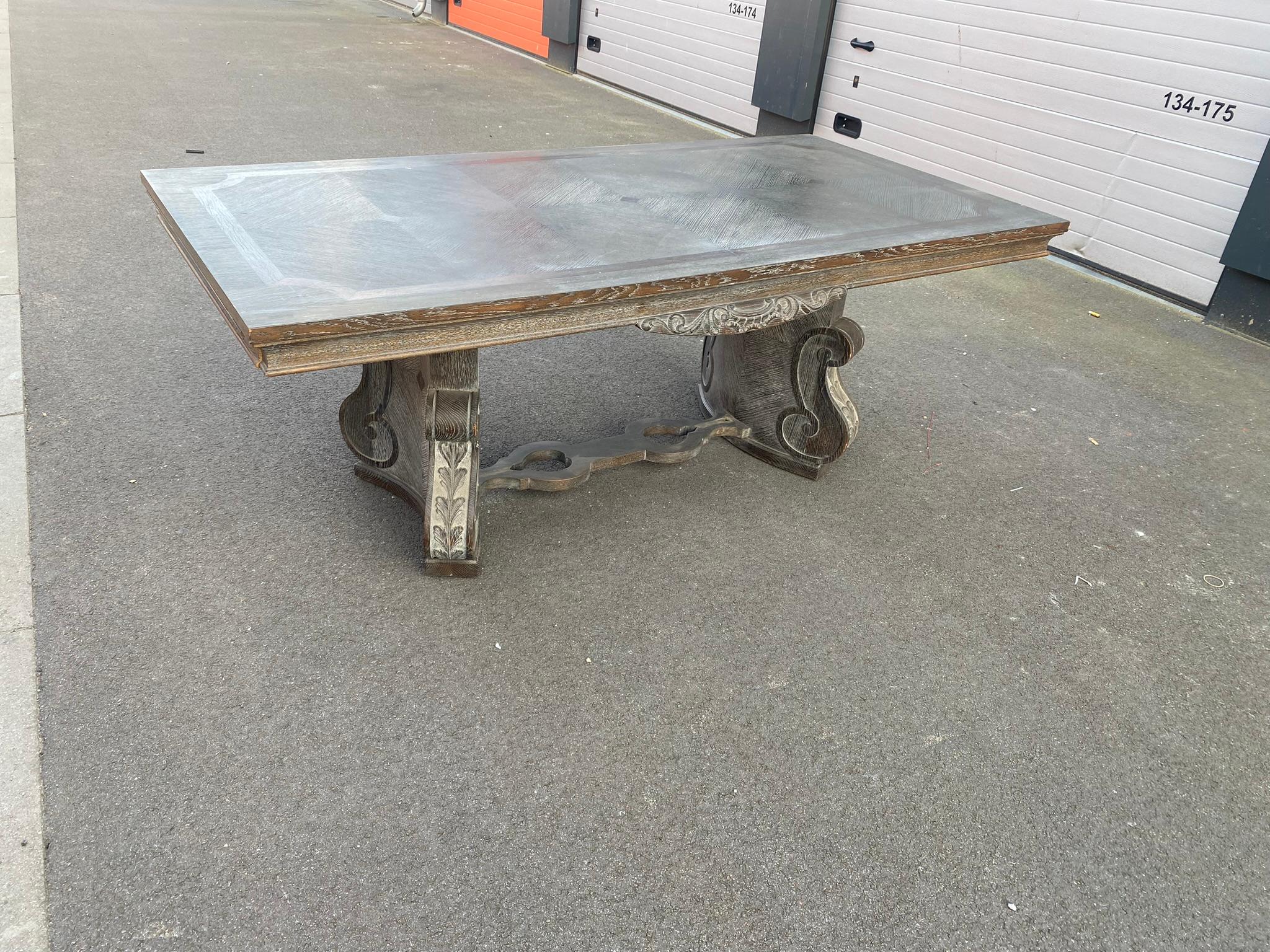 Blackened oak art deco table circa 1940/1950
Small gaps on the base
Patina to redo
2 Extensions
The patina of the extensions has remained in very good condition and gives an idea of the appearance of the restored table.
The top is inlaid with