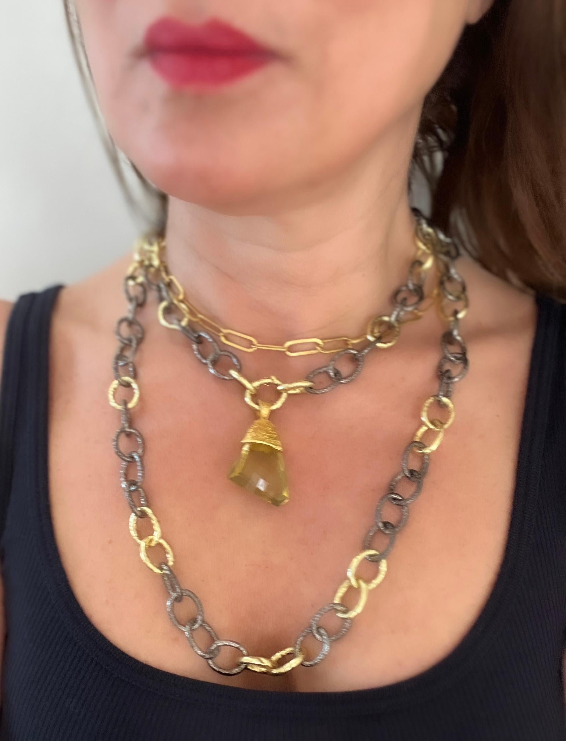 Elevate your look with this fabulous handmade thick chunky chain. The use of mixed metals takes this necklace to the next level. The handmade chain is in blackened silver and 20K gold, lightly hammered to create the perfect modern day look.
