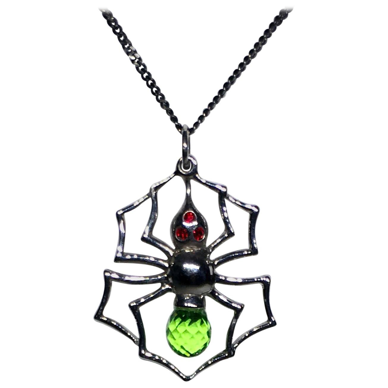 Blackened Silver Spider Pendant with Cultured Green Sapphire, and Red Zirconia