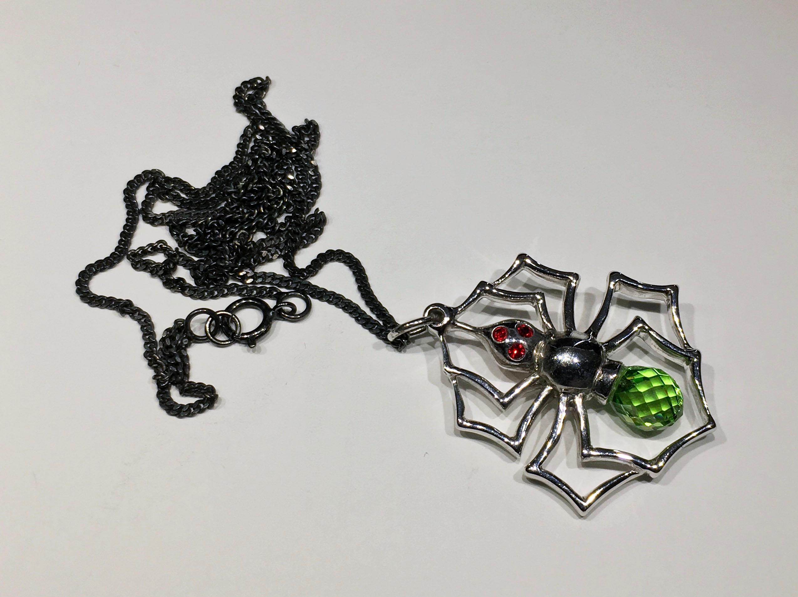 Blackened Silver Spider Pendant with Cultured Green Sapphire, and Red Zirconia 1
