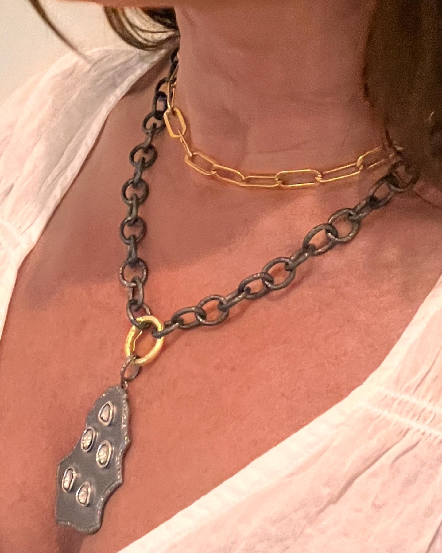 Elevate your look with this fabulous handmade thick chunky chain. The use of different metals takes this necklace to the next level. The handmade chain is in blackened silver and the clasp in beautiful 20k gold. Wear alone or clip your favorite
