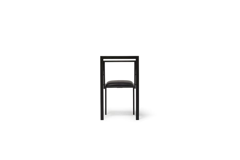 Blackened Steel Dining Chair with Black Leather Upholstered Seat In New Condition For Sale In Los Angeles, CA