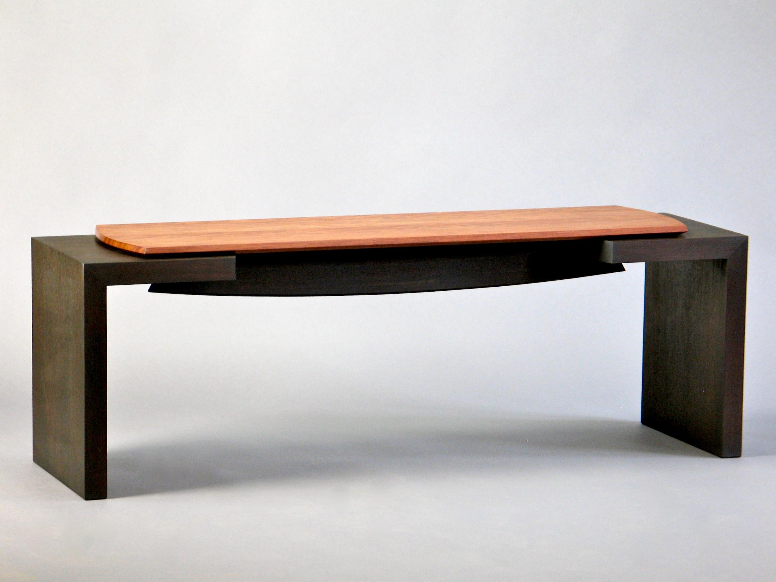 The Havana bench shown here in blacked walnut and figured bubinga can be made in custom sizes and various wood combinations and finishes. The same design details apply to all possible variations. 

The Havana bench also listed separately features