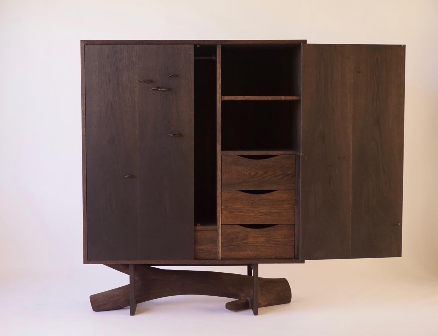 The Elm Branch Armoire is part of a group of pieces that Chris Lehrecke collaborated on with Gabriella Kiss, wife and jeweler, in 2013. The case is constructed with extra thick European white oak veneers which have been steel brushed, acid washed