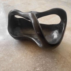 blackened wooden fruit bowl by Alexandre Noll