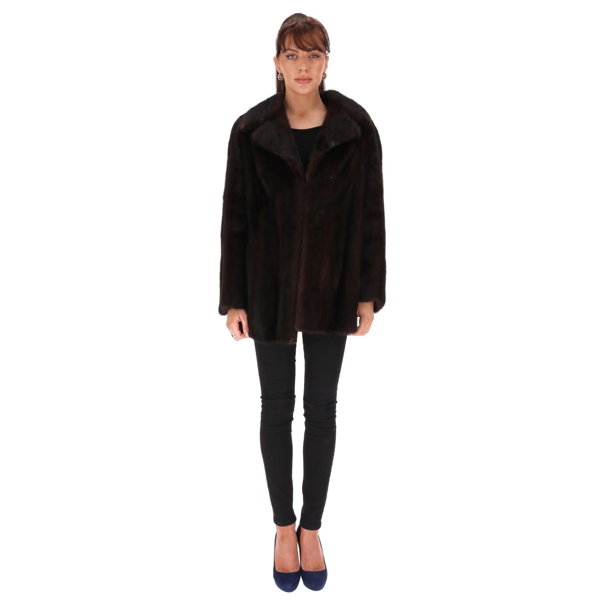 Blackglama Ranch Mink Fur Coat

Dark brown coat crafted from the finest quality of mink fur with luxurious softness.

Featuring wide lapelled collar, mid-length and hook-and-eye closure to the centre.

Rrp Approx. £7,000

Size – S (Label missing but