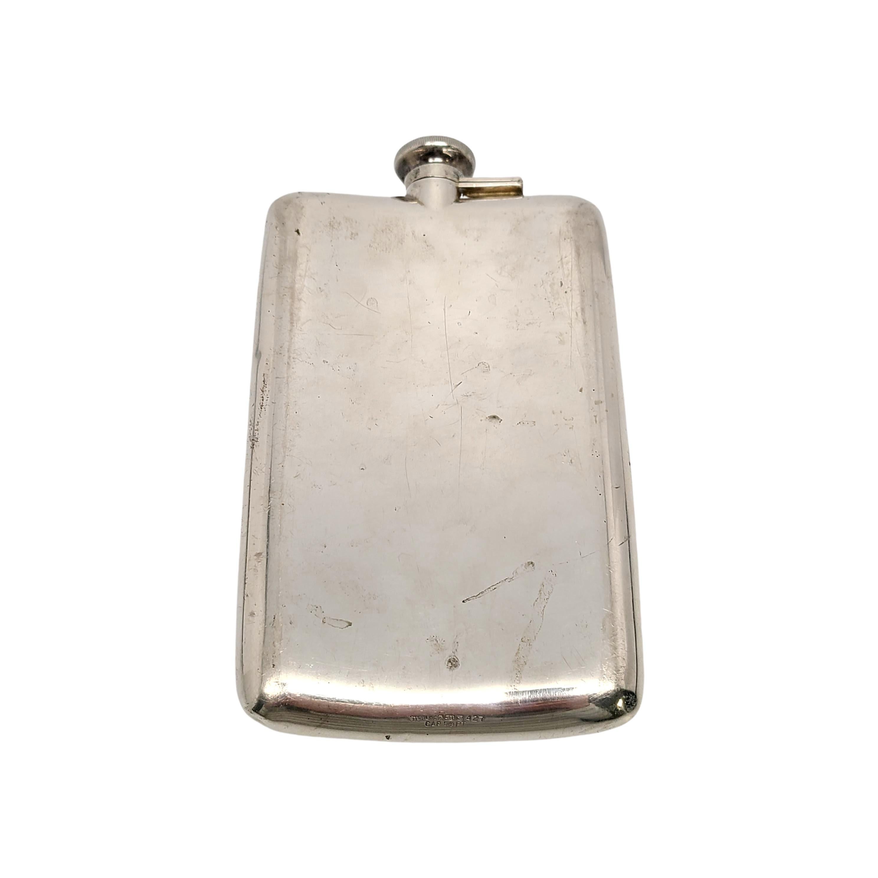 Sterling silver large  flask by R. Blackinton & Co.

No monogram

The streamlined mid-century design flask has a screw top with original inner cork. Hold 5/8 pint.

Measures 7 1/8