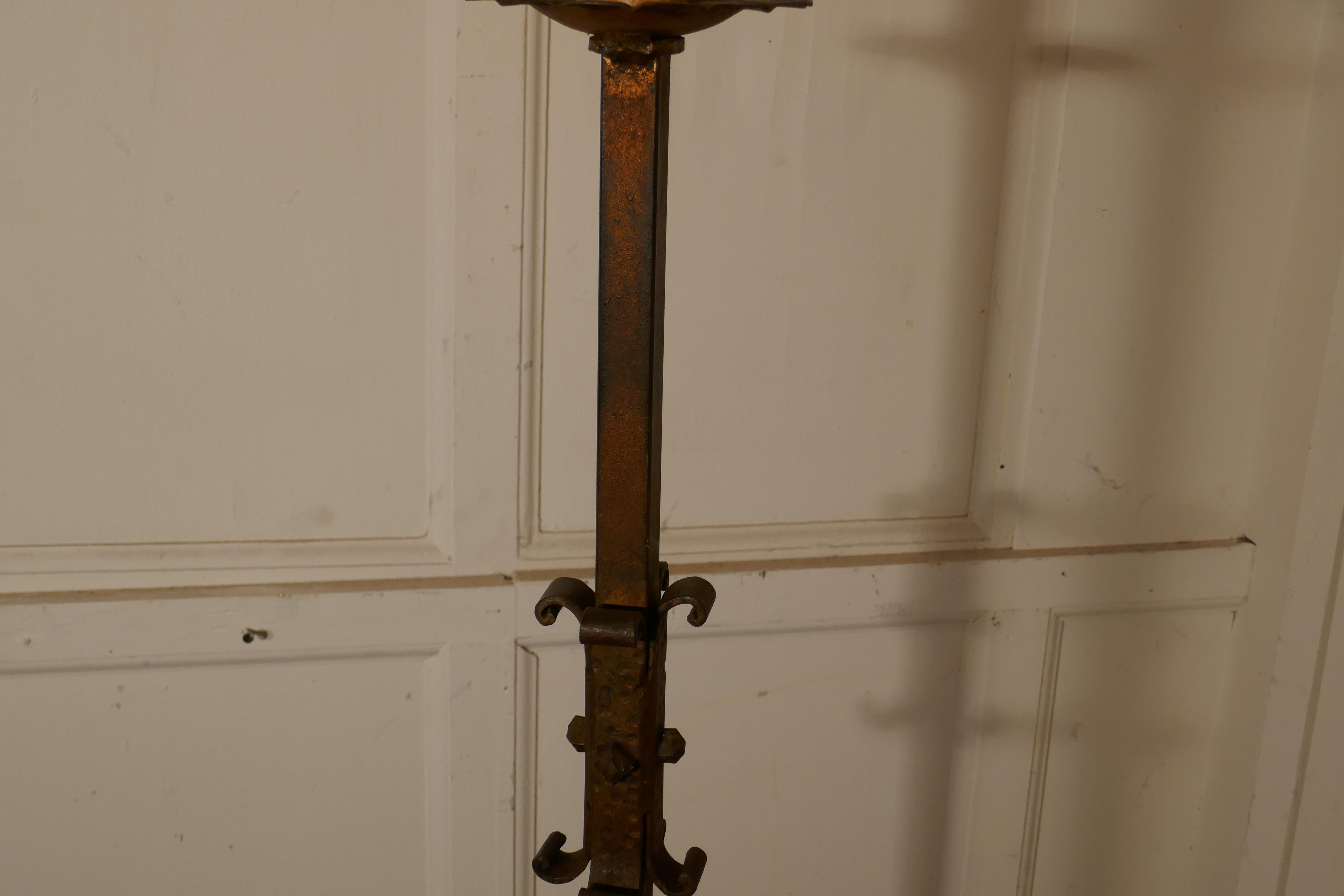 Blacksmith made Gothic wrought iron floor lamp


This is a very unusual Gothic wrought iron floor lamp the stand is blacksmith made, it stands on 3 feet and has a wax candle hiding the bayonet which sits on the sconce saucers
An unusual piece,