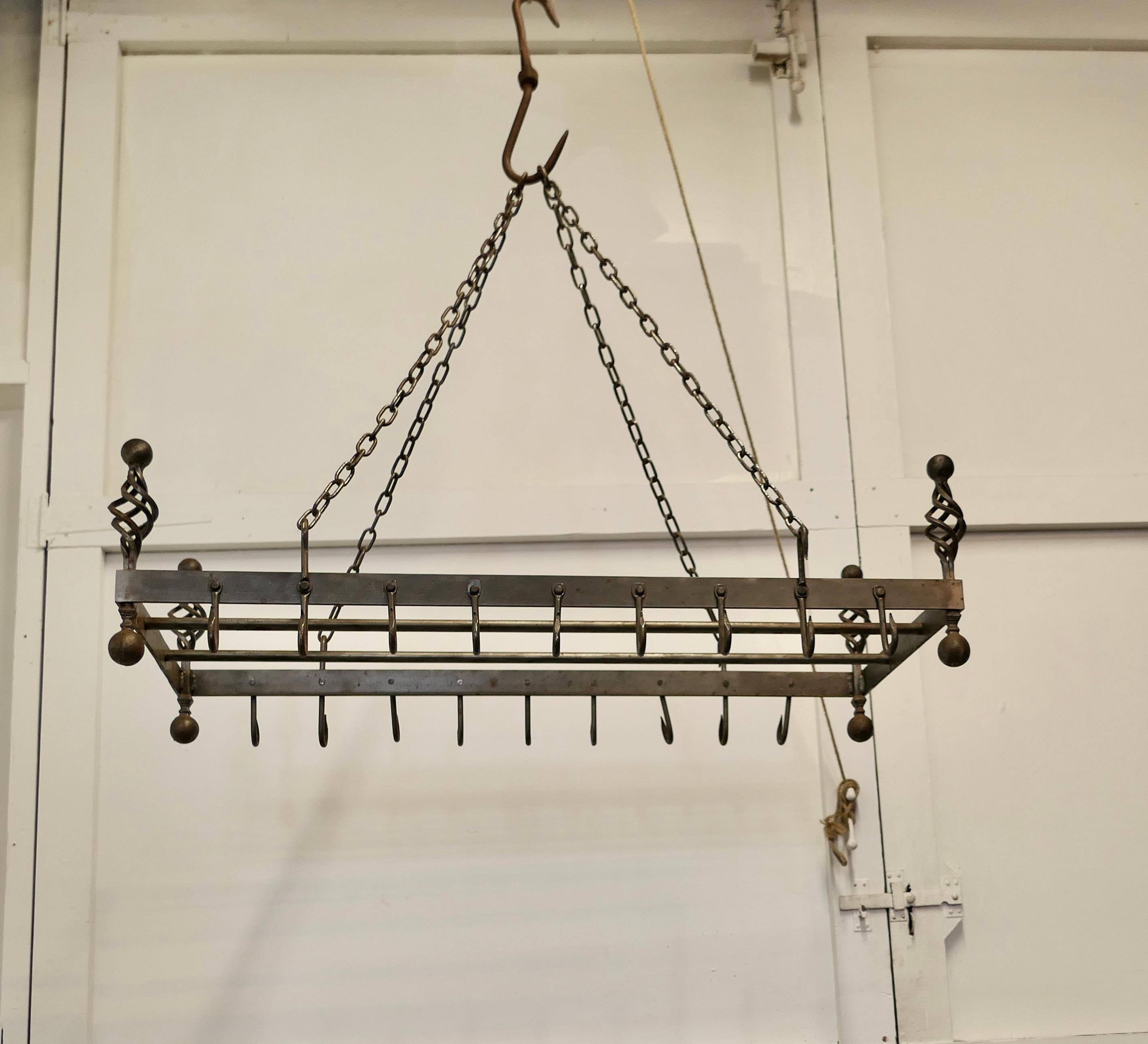 Blacksmith made iron game hanger, kitchen utensil or pot hanger.

A great piece with lots of Character, it is a large rectangular piece it is set with 18 iron hooks, if you don’t need it to hang your game on how about your pots or kitchen