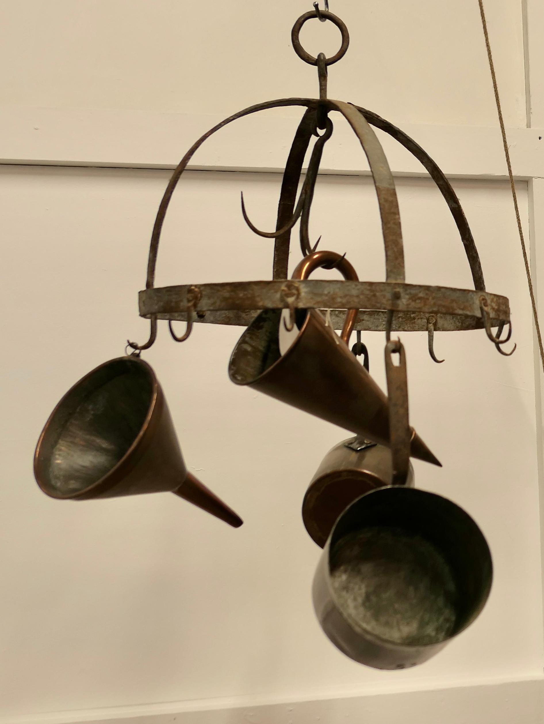 Blacksmith Made Iron Game Hanger, Kitchen Utensils or Pot Hanger

A great old piece with lots of Character, if you don’t need it to hang your game on how about your pots or kitchen utensils, the hanger is round with a triple hook in the centre 8