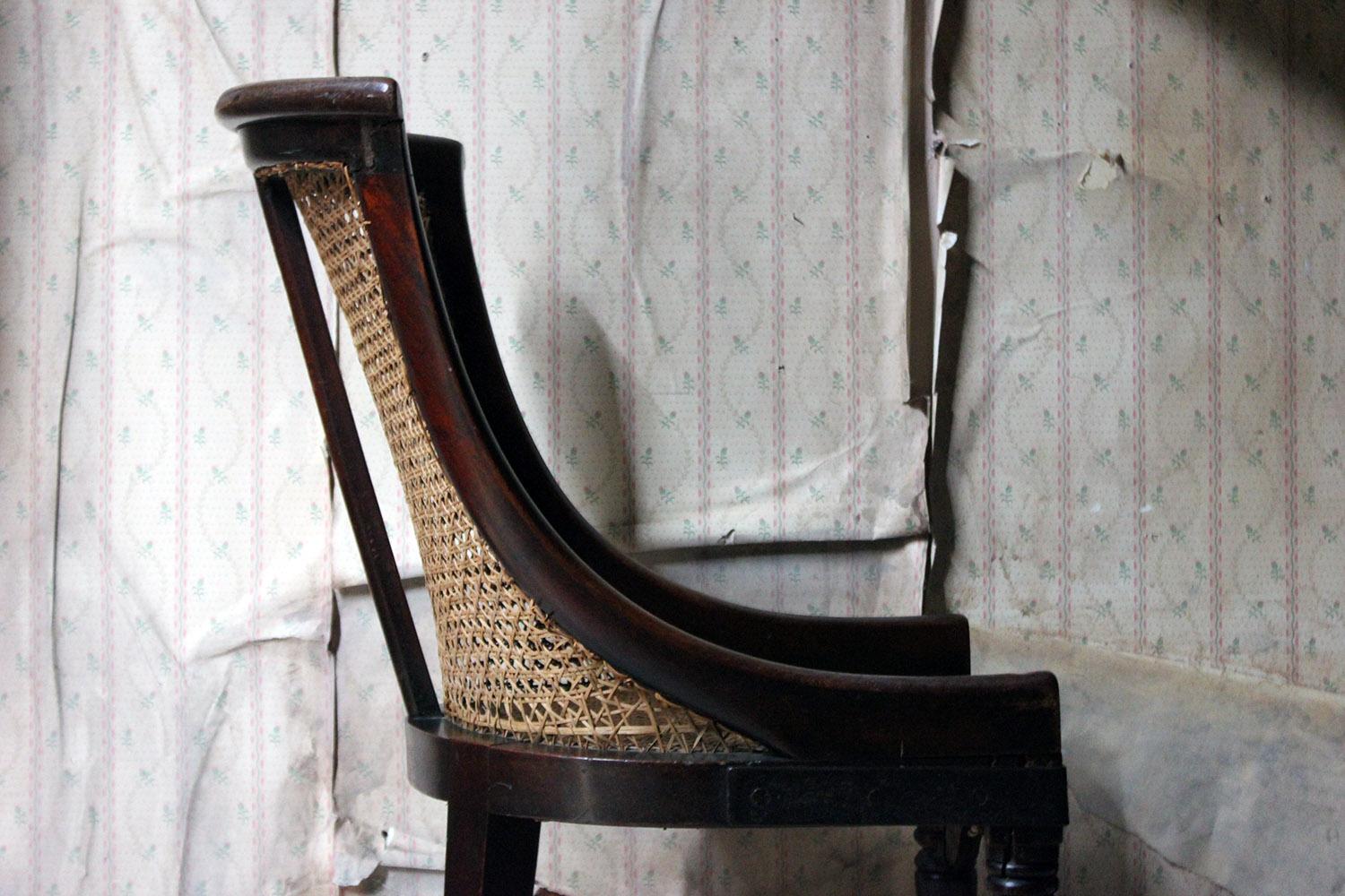 English Blacksmith Repaired Regency Mahogany Library Bergère Chair, circa 1815