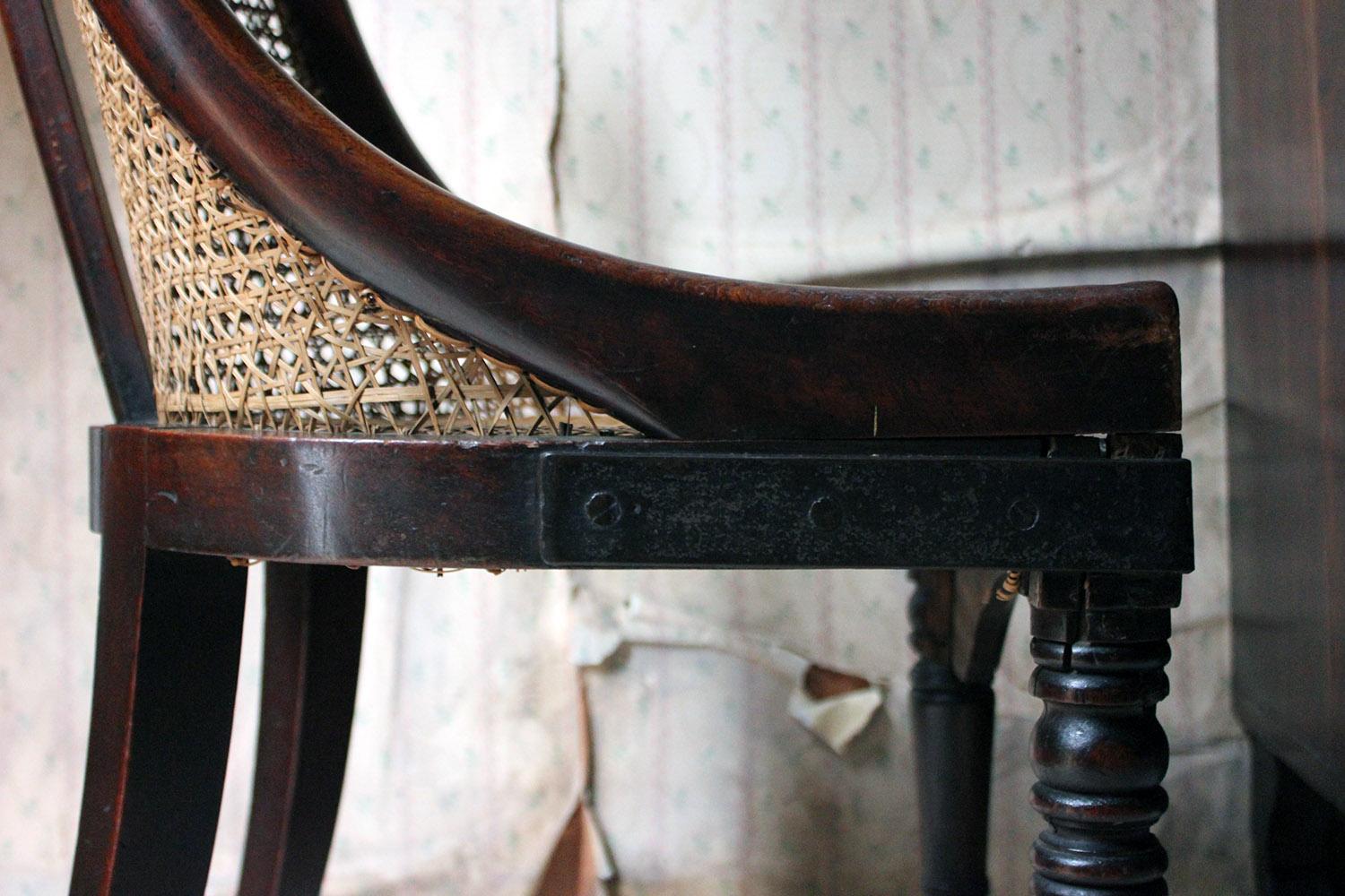 Blacksmith Repaired Regency Mahogany Library Bergère Chair, circa 1815 In Fair Condition In Bedford, Bedfordshire