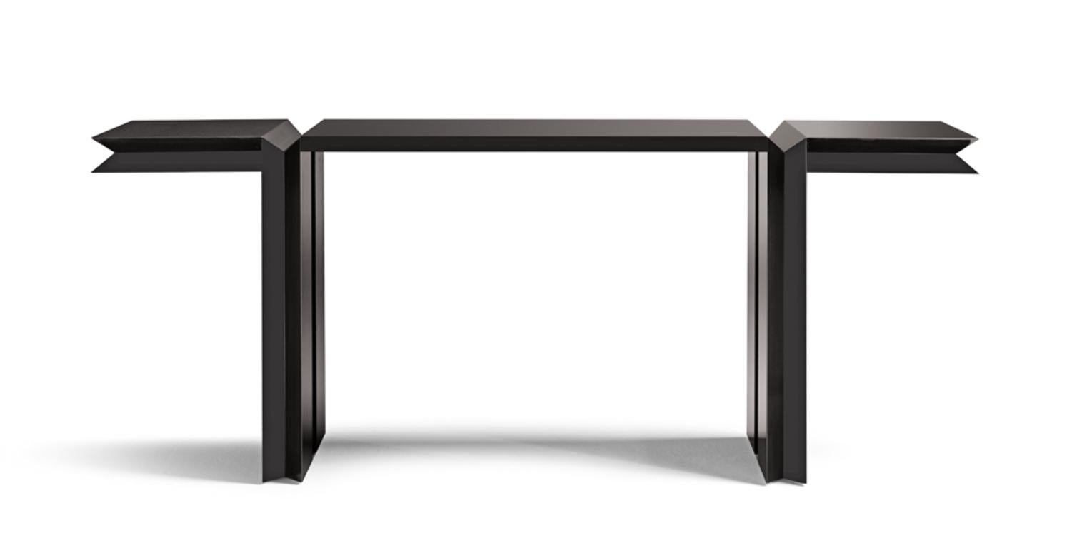 
Introducing the Blade/C Console—an Italian masterpiece that transcends the ordinary, where craftsmanship and contemporary design converge in a symphony of elegance. This handcrafted console is more than furniture; it's a statement, a testament to