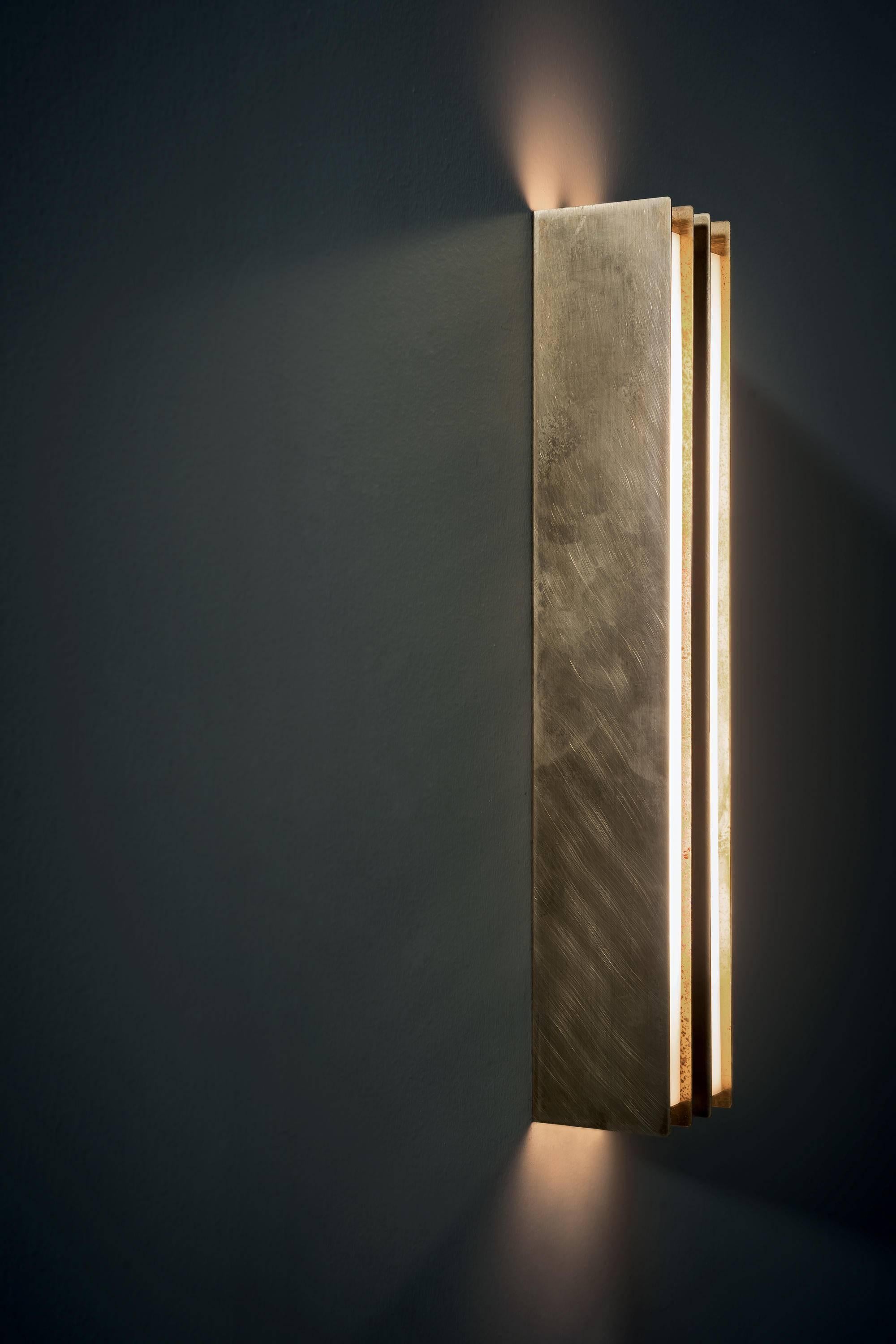 Blade is a beautiful LED wall lamp with satin-finish brass frame. Available in three different sizes. To purchase each size individually.

Small - 30 H x 3.5 W x 10 D cm

Medium - 60 H x 3.5 W x 10 D cm

Large - 160 H x 3.5 W x 10 D cm.