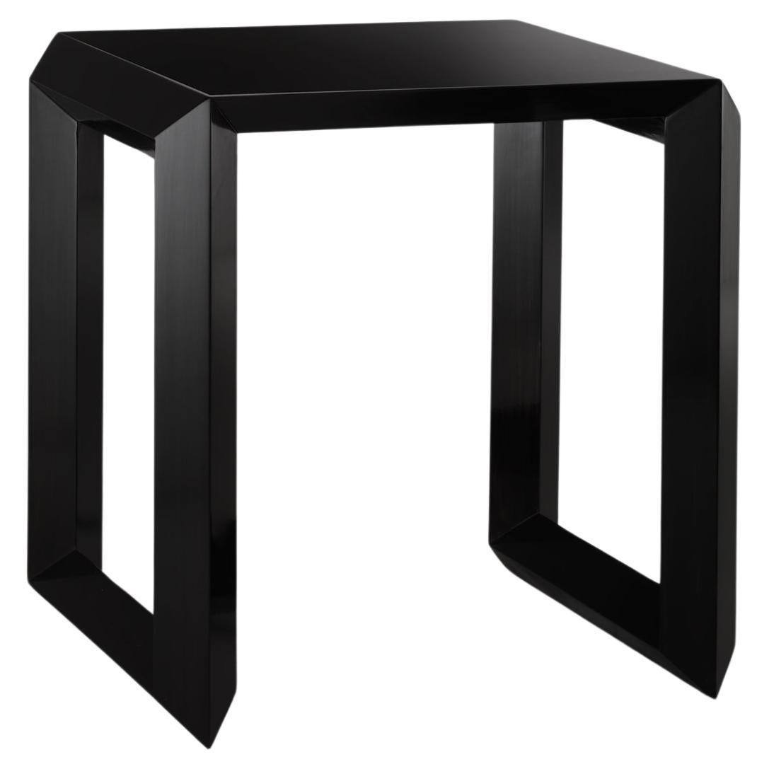The exterior of the table features a lustrous shiny China finish, lending a sleek and sophisticated touch to the overall design. This glossy exterior adds a luxurious sheen that catches the eye and exudes refinement.

The smaller cube within the
