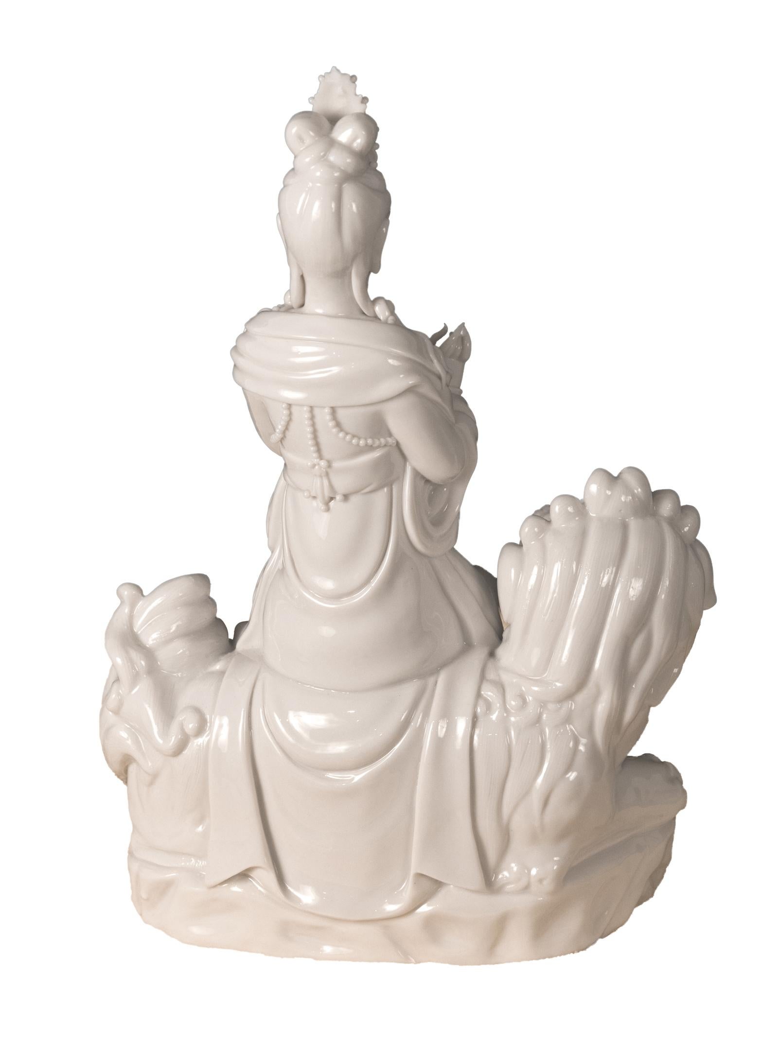 Chinese Blanc de Chine 'Dehua' Porcelain Figural Group of Quan Yin on Foo Dog or Temple