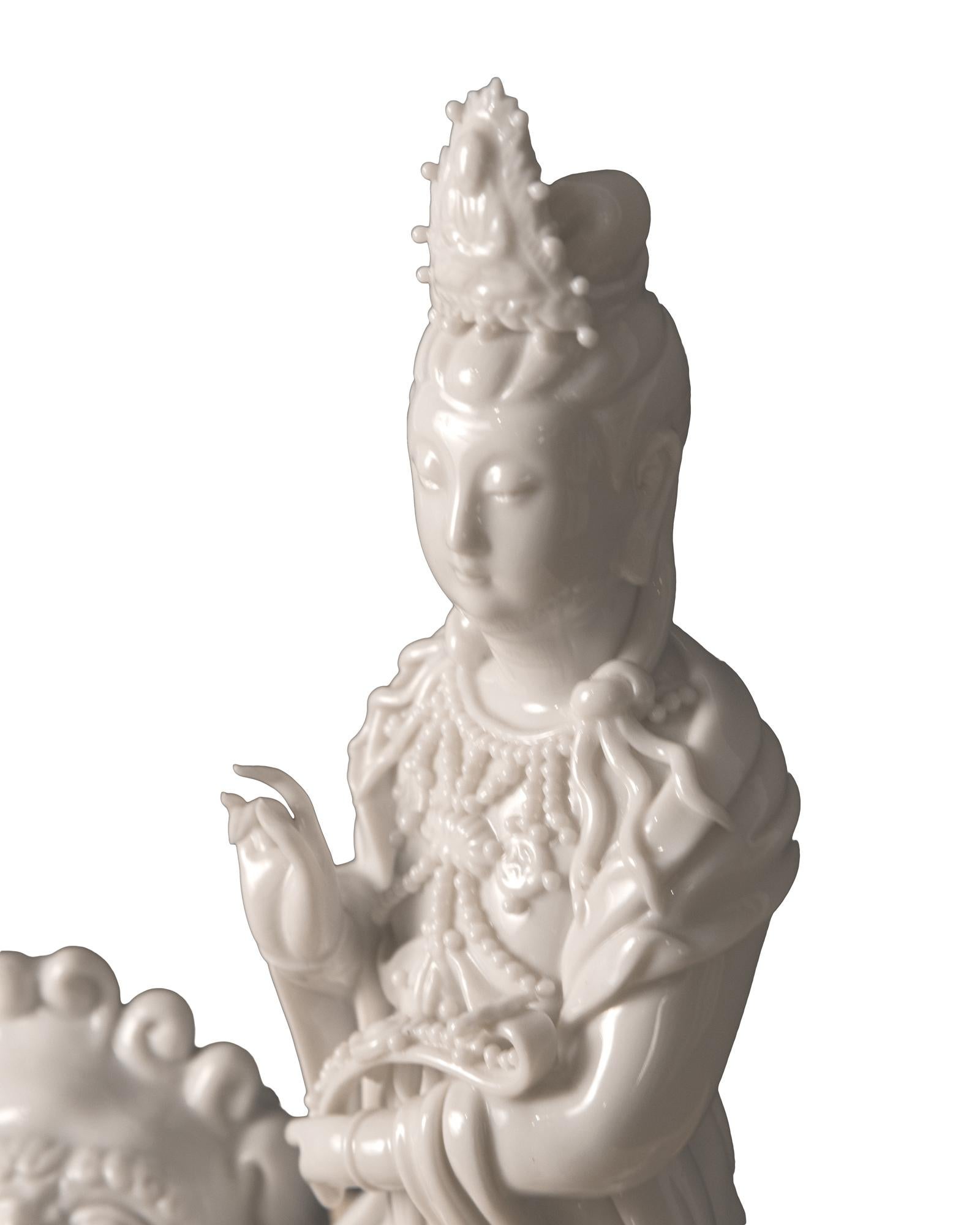 Blanc de Chine 'Dehua' Porcelain Figural Group of Quan Yin on Foo Dog or Temple 1