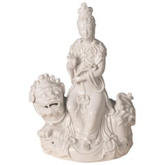 Blanc de Chine 'Dehua' Porcelain Figural Group of Quan Yin on Foo Dog or Temple