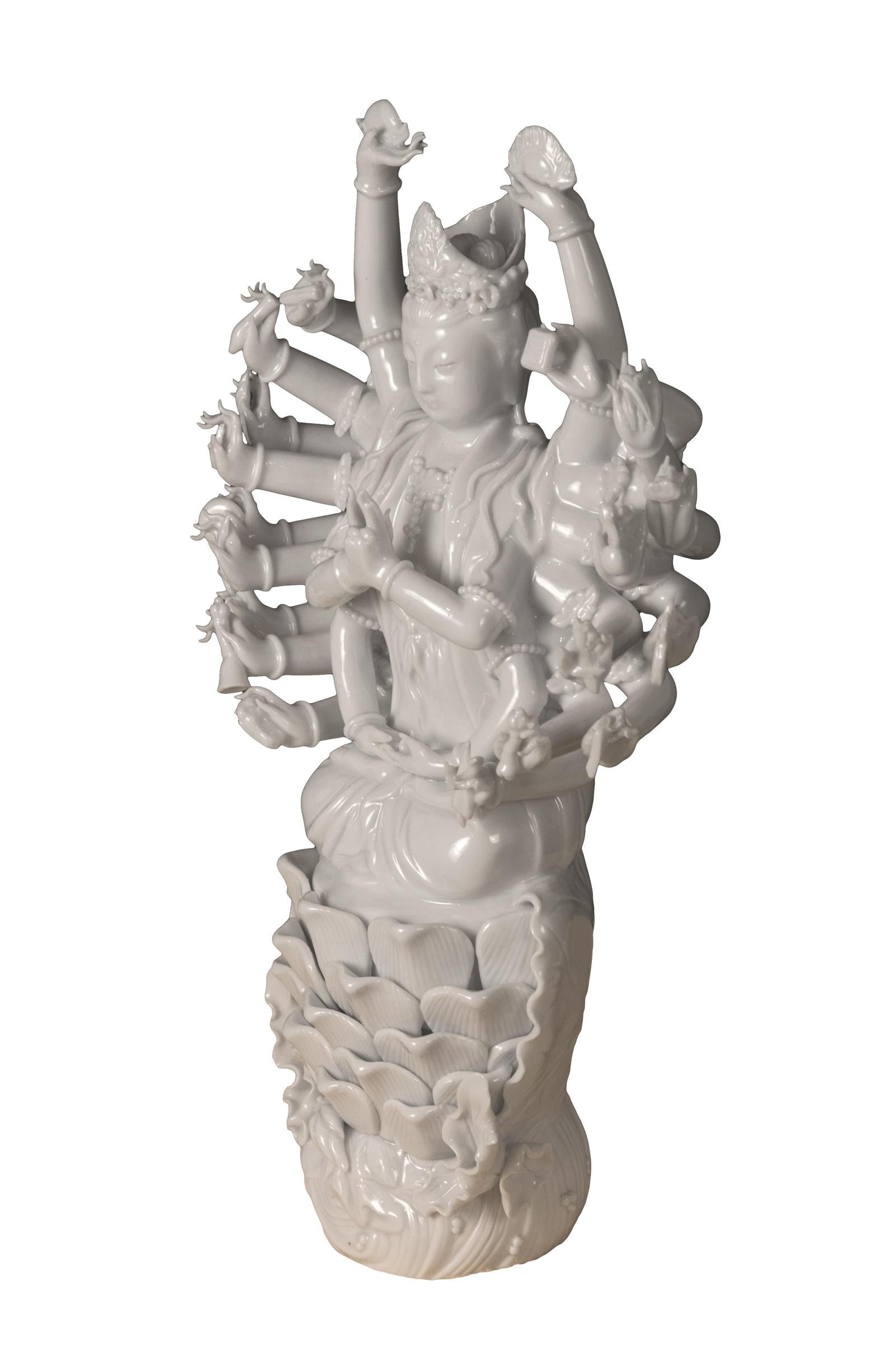 Blanc de chine (Dehua) porcelain figure of Guanyin with her thousand hands, (circa 1980).

China

Measures: 12 x 7.5 x 3.75.