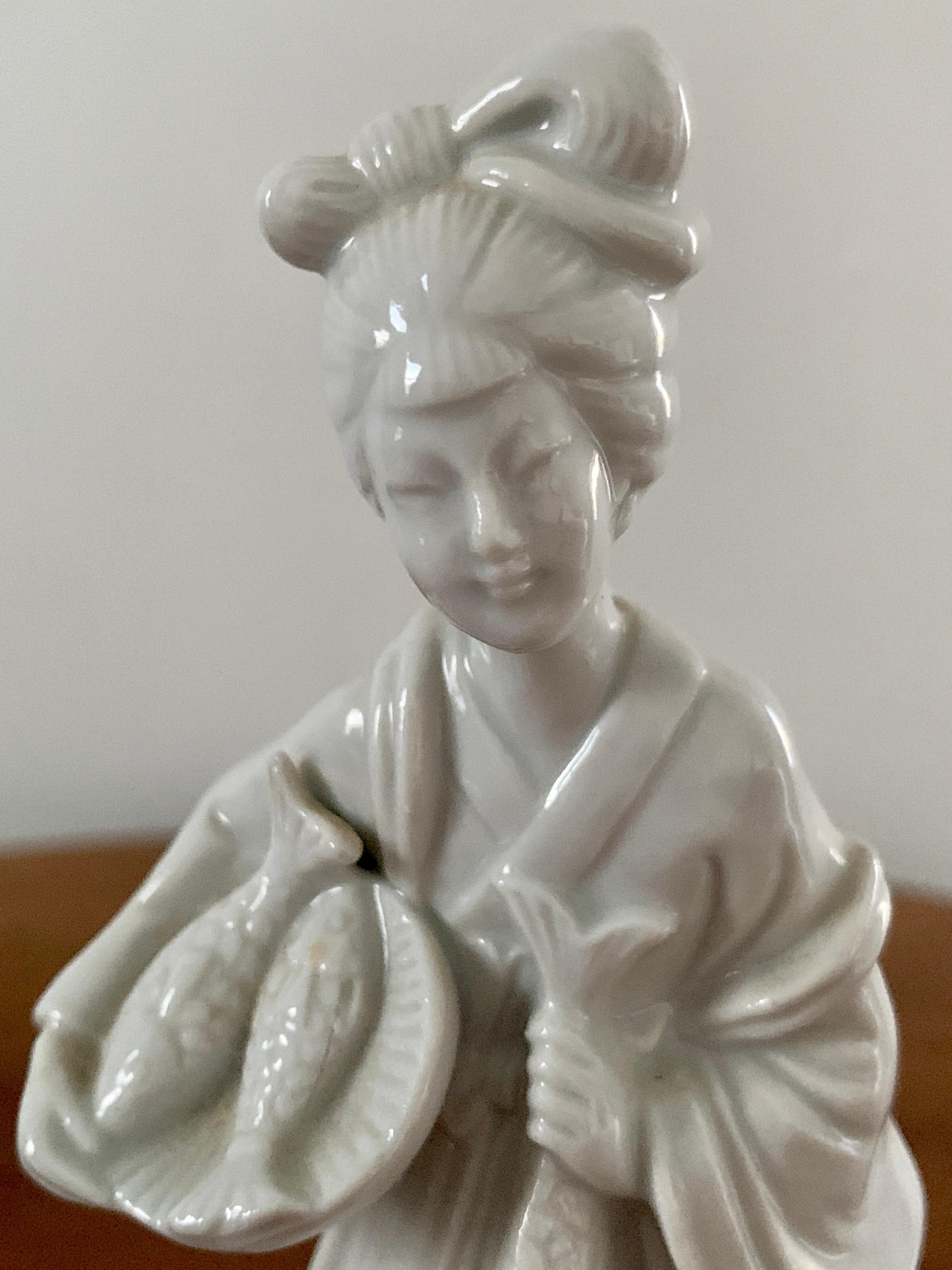 Chinoiserie Blanc De Chine Porcelain Woman with Fish For Sale