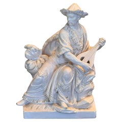 Blanc de Chine White Glazed Seated Musician Figure