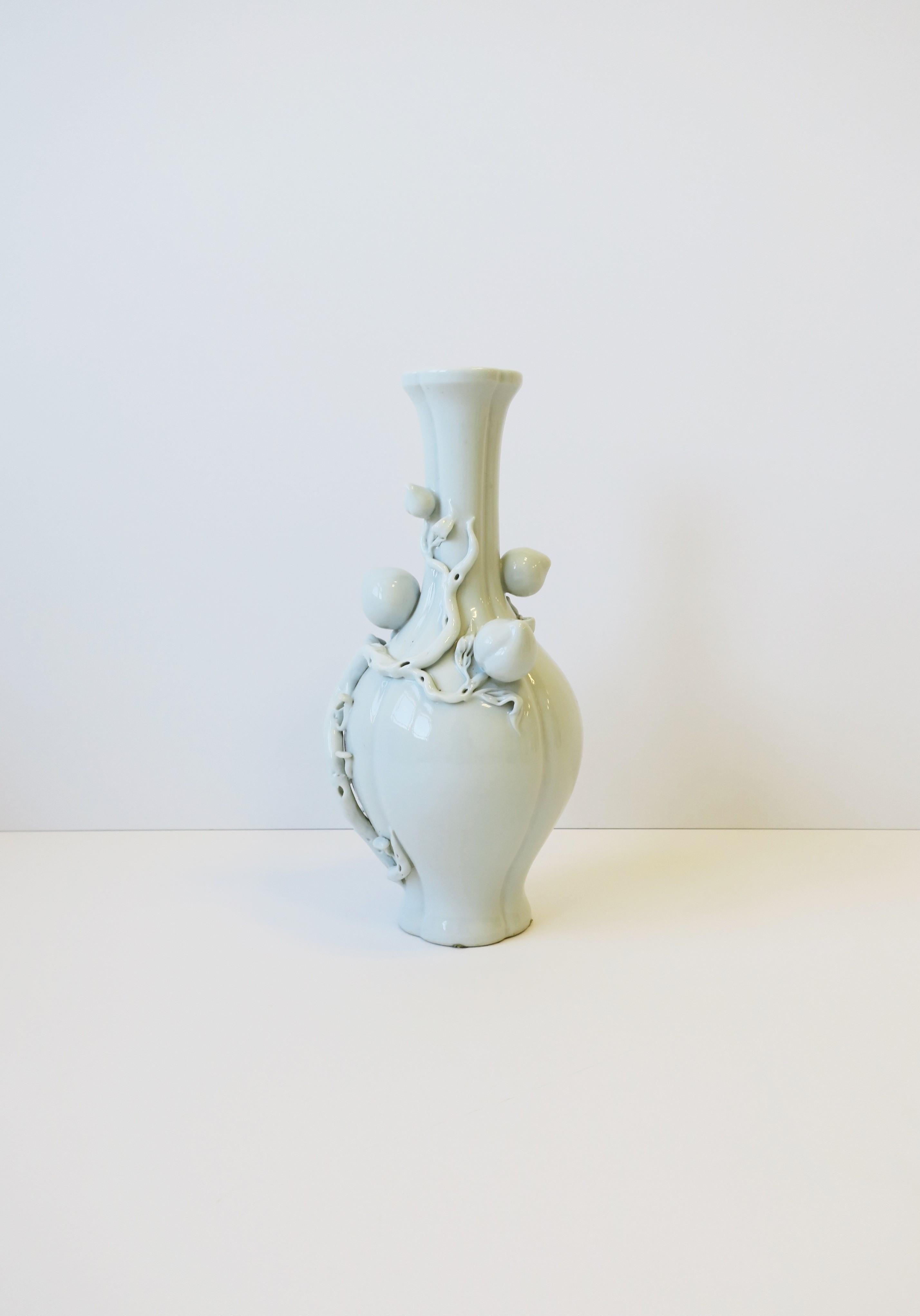 20th Century White Blanc de Chine Porcelain Vase with Fruit, Leaves and Vines For Sale