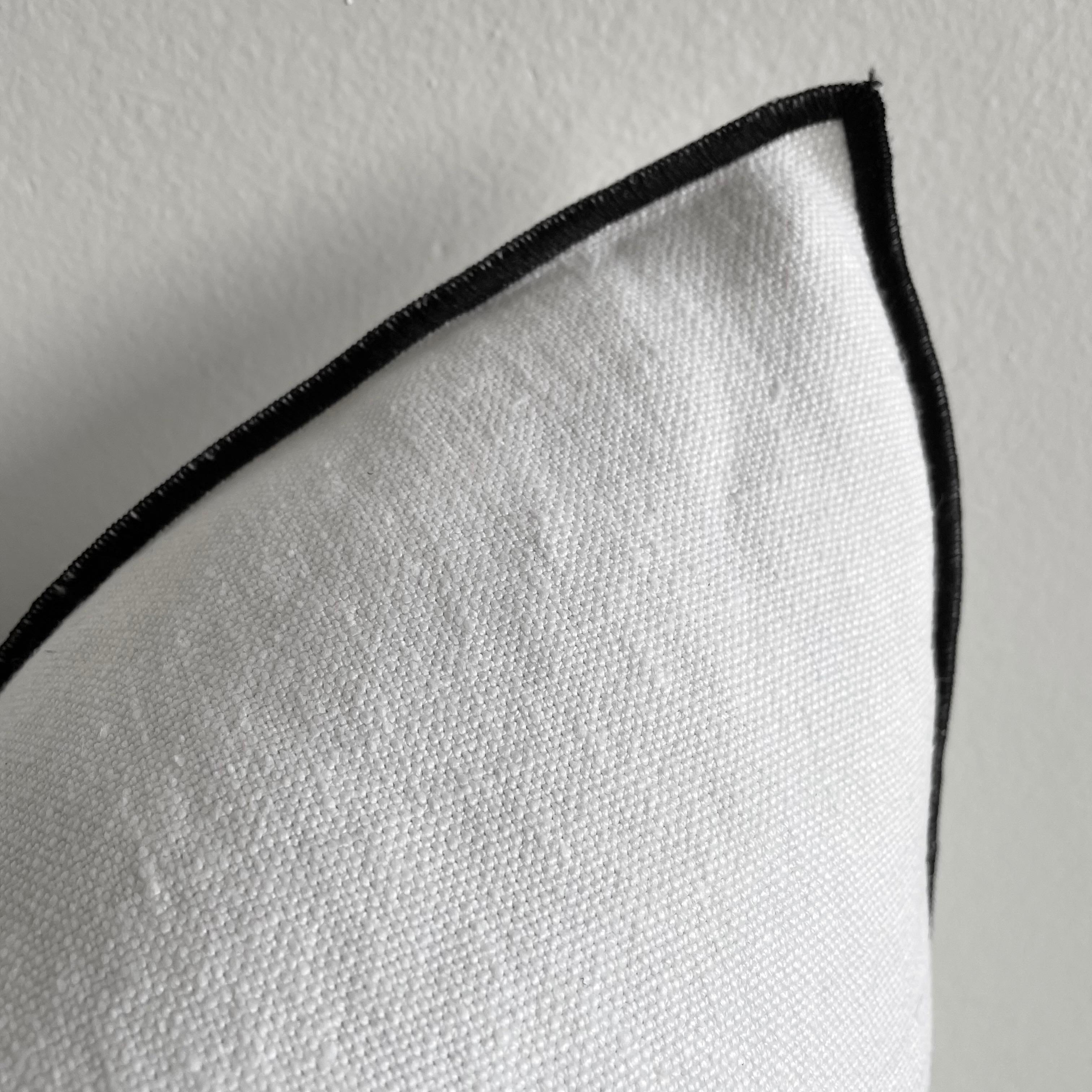 Custom linen blend accent pillow. Color: Blanc A white/ light grey colored nubby textured style pillow with a stitched edge, metal zipper closure. Our pillows are constructed with vintage one of a kind textiles from around the globe. Carefully