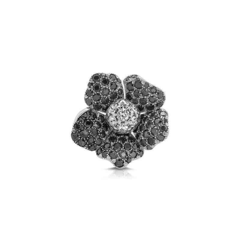  Blanc Noir Diamond Floral Cocktail Ring features fine quality brilliant cut black and white diamonds in a contemporary floral design. 
This magnificent piece was one of a pair of large stud earrings which we converted to a one of a kind cocktail 