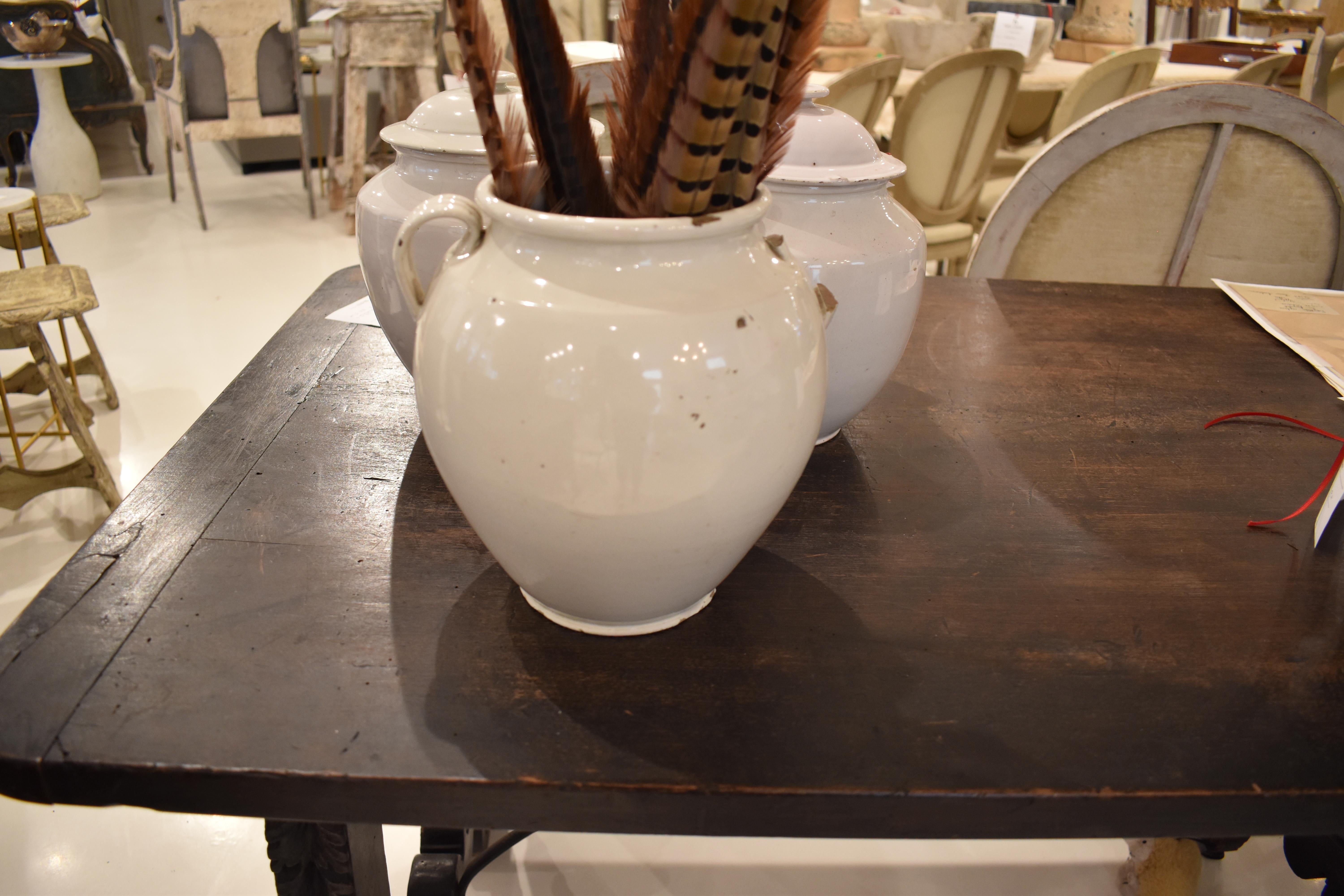 Perfect neutral white pot, which is a great accent piece for you home. 
**Third pot has a missing lid and handle; and it's slightly taller and wider than the other two pots.