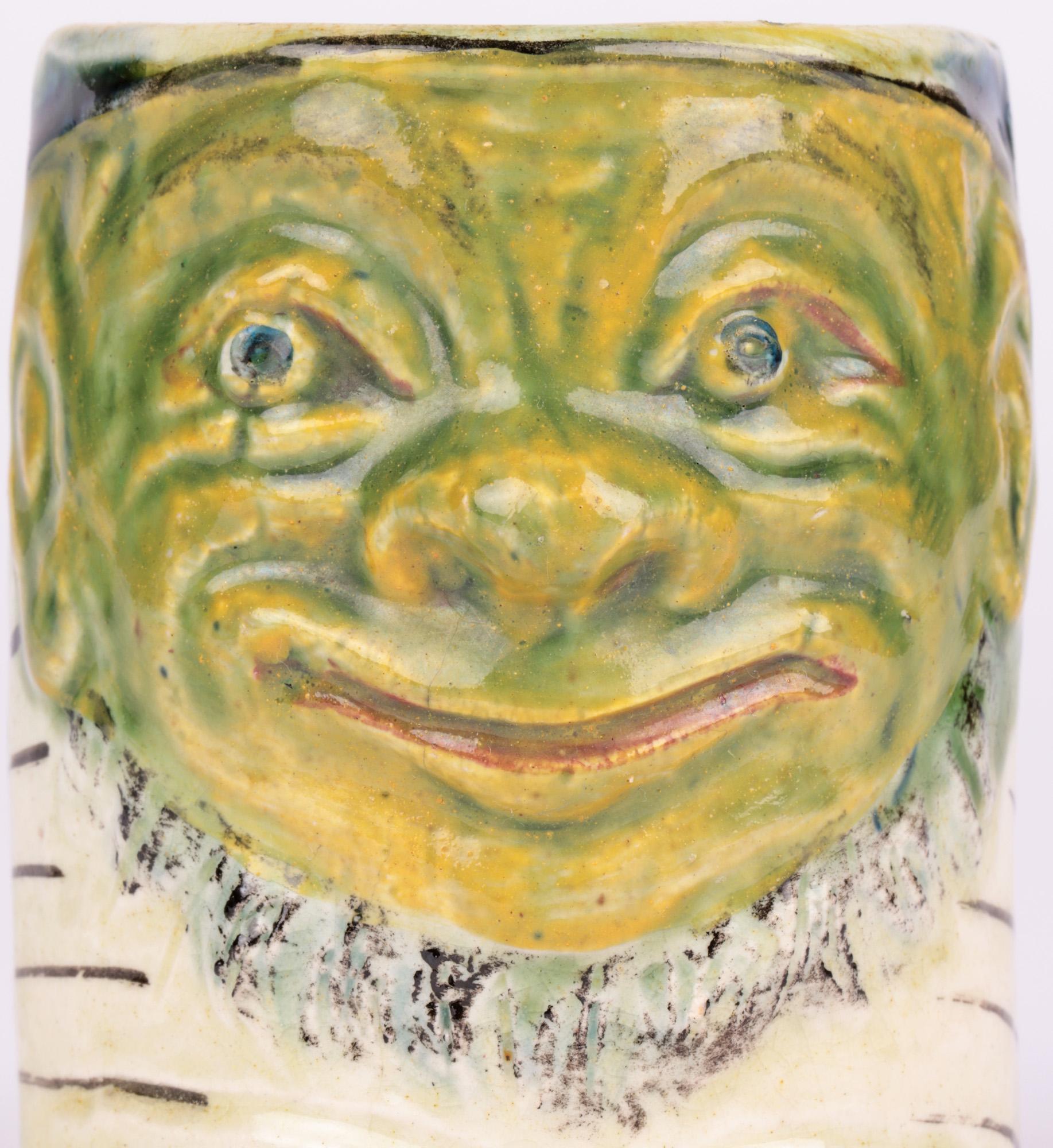 A rare English art pottery Boer War mug portraying Paul Kruger designed by renowned British ceramic artist, painter and writer Blanche Georgiana Vulliamy (English/Belgian, 1869-1923) and dated 1900. The earthenware mug is of small size and thickly