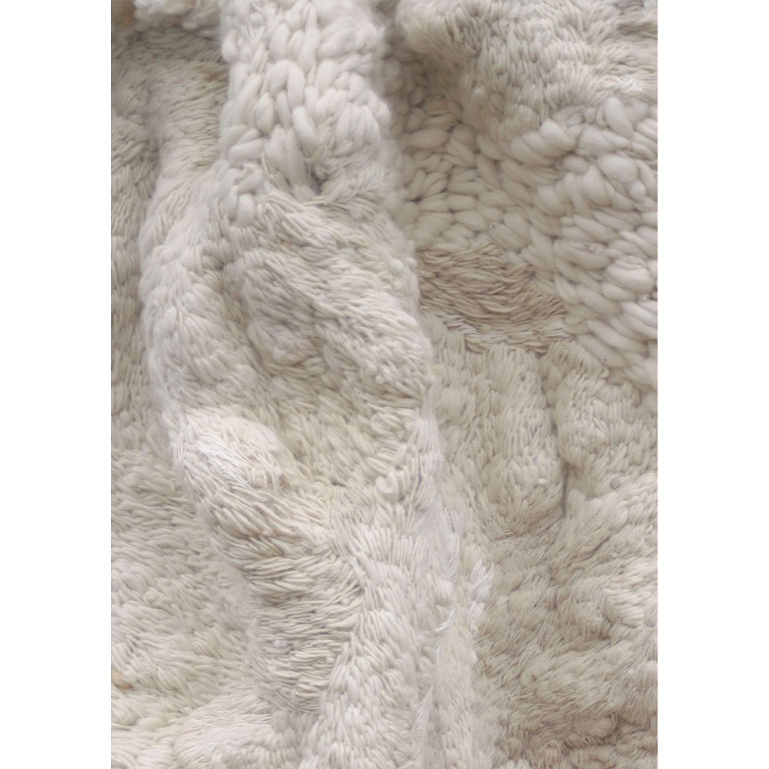Blanco Tapestry / Rug by Vera Somlo
Unique piece
Dimensions: 170 x 210 cm
Materials: Organic Wool, Ilama Fiber

Handspun and embroidered with pure organic wool and llama fiber.

Vera was born in Bariloche Argentina in 1979. In 1997 Vera