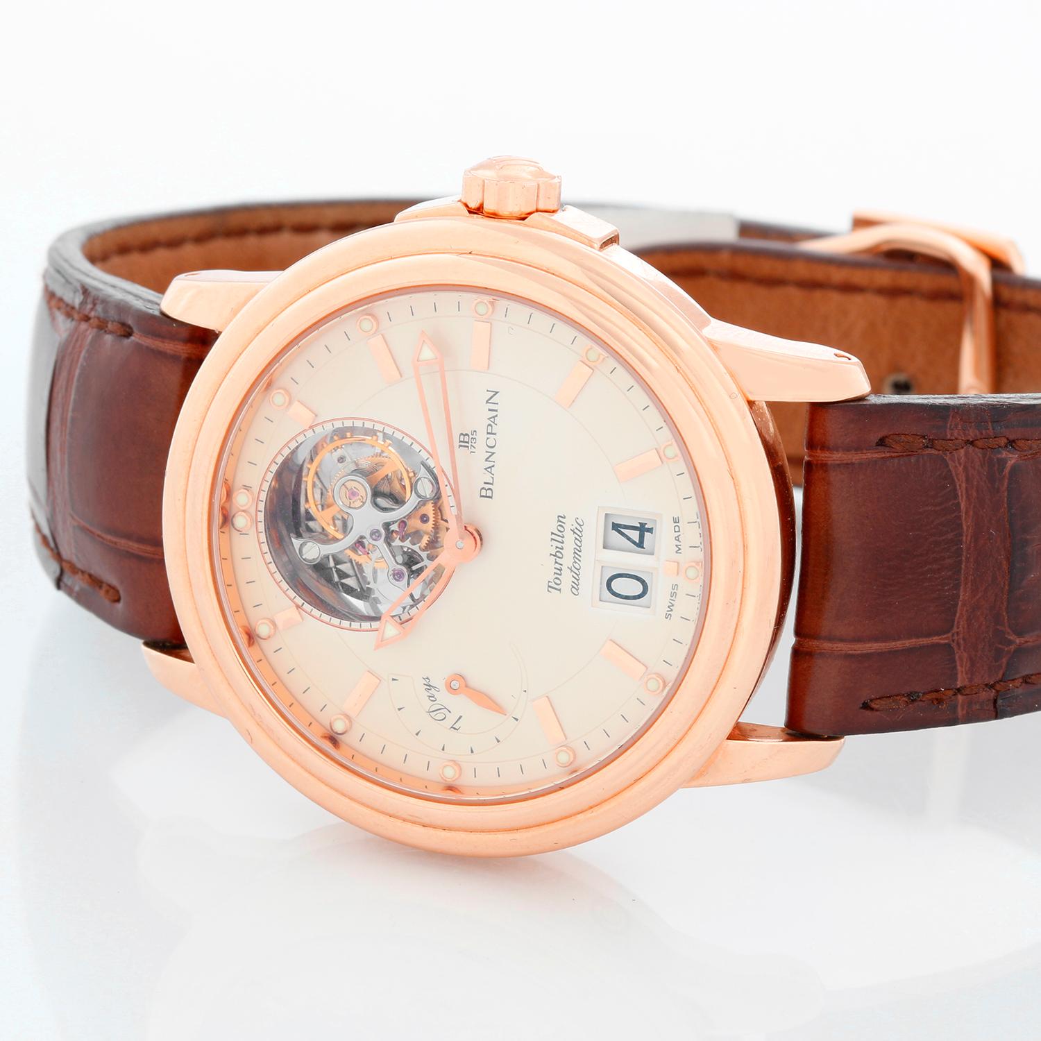 Blancpain 18K Rose Gold Leman Tourbillon Watch Ref 2825 - Automatic winding ; Tourbillon. 18K Rose gold case ( 38 mm). Creme dial with big date at 6 o'clock. Brown alligator strap with 18K Rose gold deployant buckle. Pre-owned with Blancpain box.