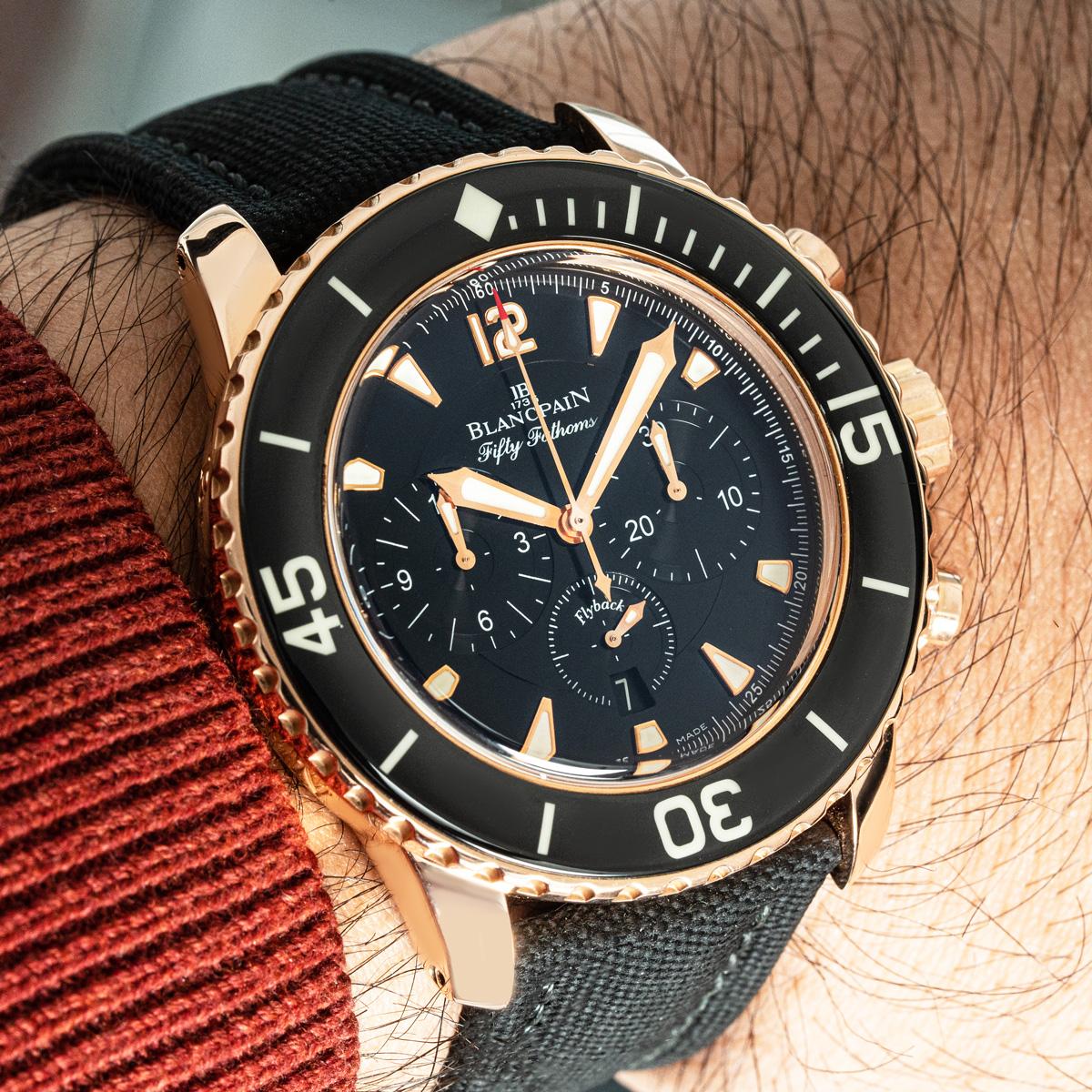 A mens Fifty Fathom's Flyback chronograph crafted in rose gold by Blancpain.

Features a black dial with a date display at 6 0'clock, as well as the 'Flyback' chronograph function which allows instant restarting of the chronograph with one button,