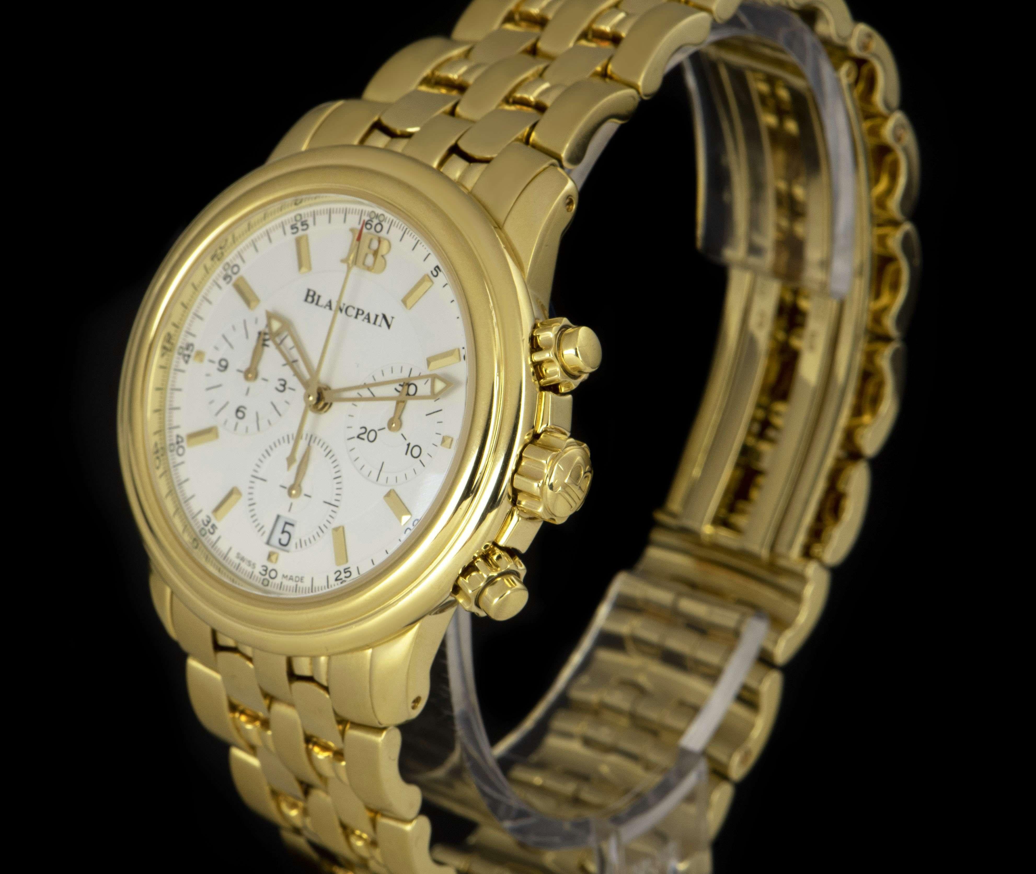 A 38mm 18k Yellow Gold Leman Chronograph Gents Wristwatch, white dial with applied hour markers, 30 minute recorder at 3 0'clock, small seconds and date at 6 0'clock, 12 hour recorder at 9 0'clock, a fixed 18k yellow gold stepped bezel, an 18k