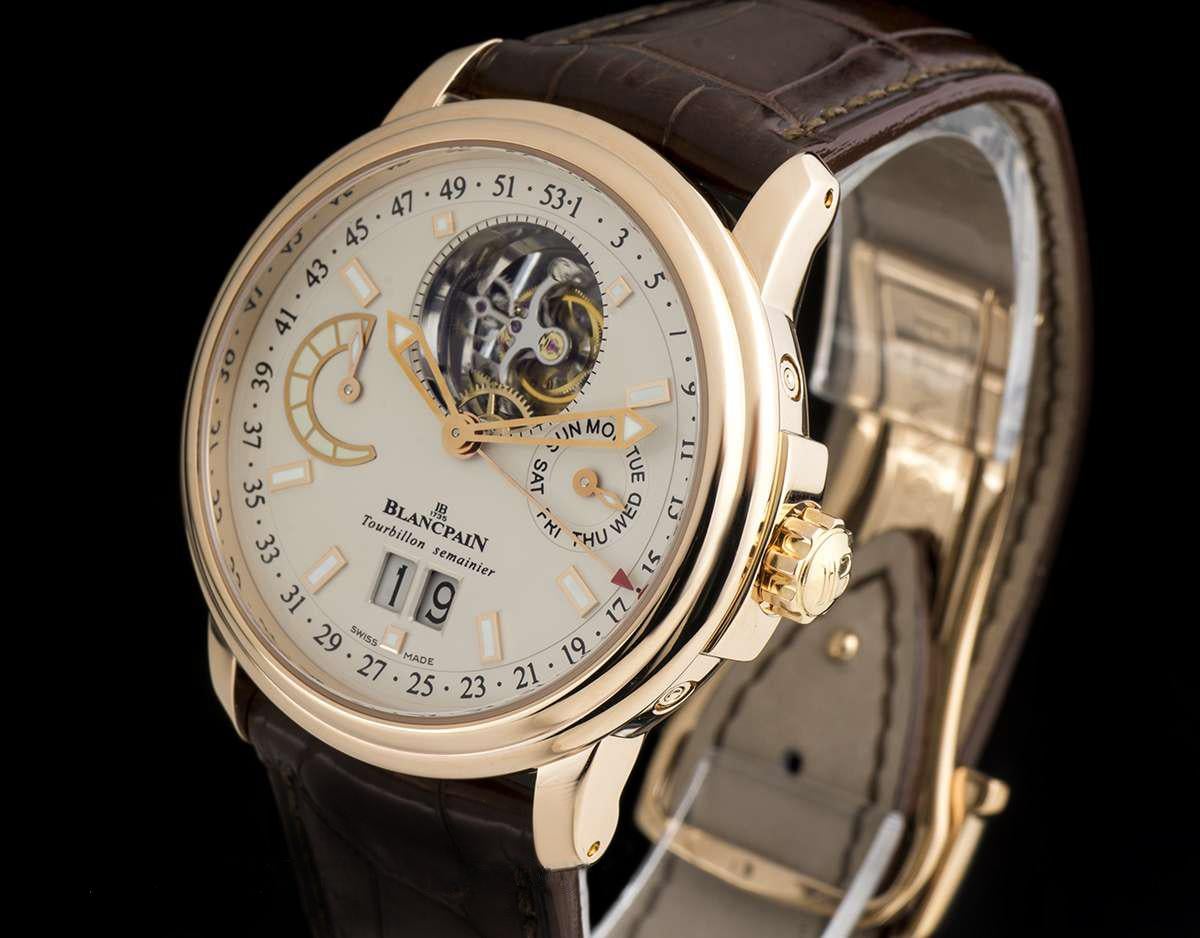 An 18k Rose Gold Leman Tourbillon Semainier Grande Date Gents Wristwatch, silver dial with applied hour markers, day at 3 0'clock, date at 6 0'clock, power reserve indicator at 9 0'clock, week number on the outer edge of the dial indicated by the