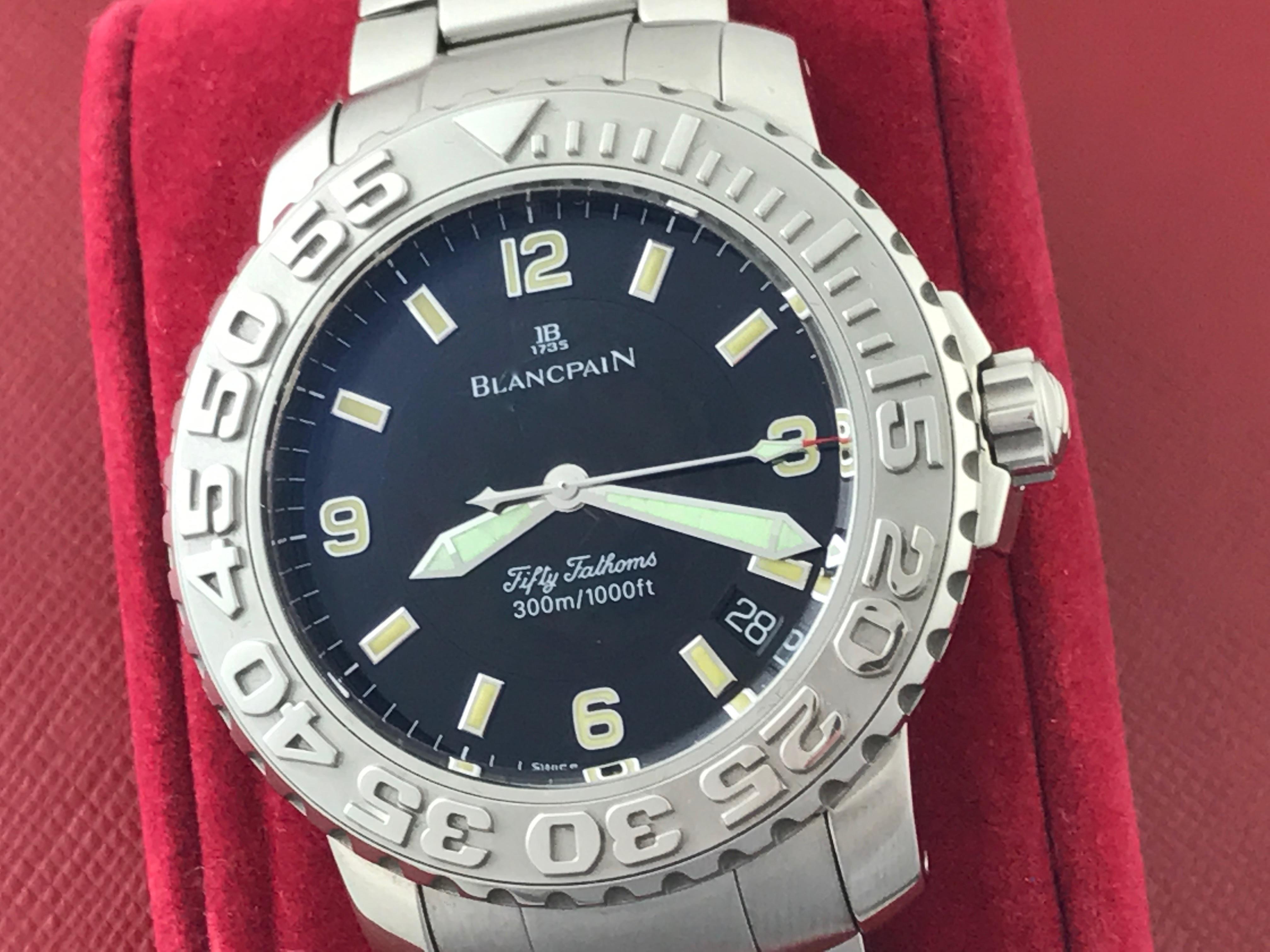 Blancpain Fifty Fathoms, model 2200.1130.71 Mens automatic wristwatch.  Stainless Steel round style case with rotating bezel (40mm dia.). Water Resistant to 300 Meters. Stainless steel Blancpain bracelet with deployant clasp. Black Dial with