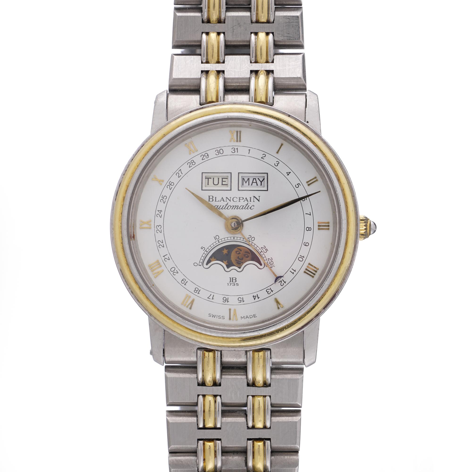 Orologio da polso in acciaio e oro giallo Blancpain Villeret Ref. 6595 Orologio da polso con triplo calendario e fasi lunari, prodotto circa negli anni '90
Questo elegante modello presenta una cassa da 32 mm con lunetta in oro giallo, un quadrante