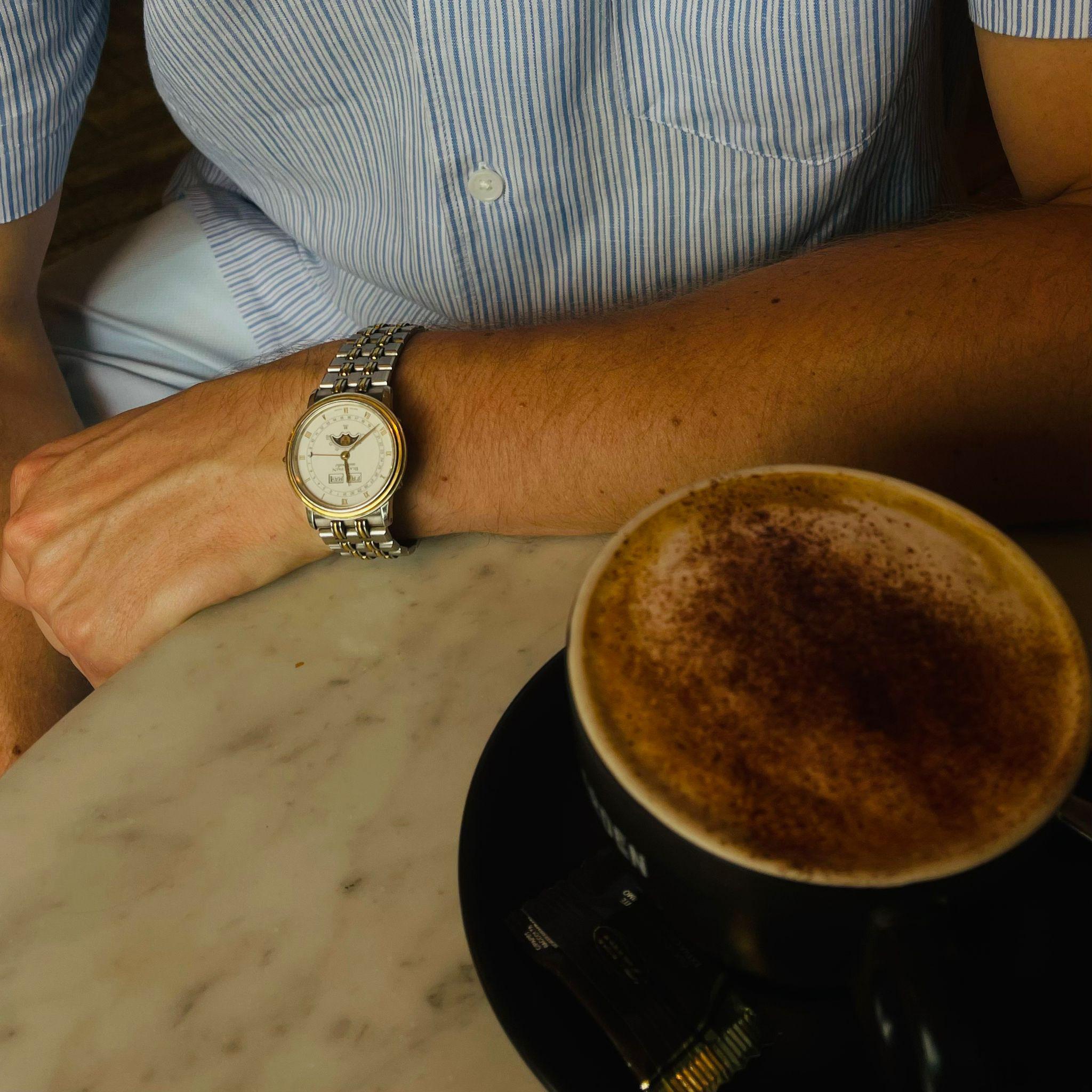 Stainless steel and yellow gold Blancpain Villeret Ref. 6595 triple calendar wristwatch with moonphase, produced circa 1990s
This elegant model features a 32mm case with a yellow gold bezel, a crisp white dial with applied Roman numerals, and