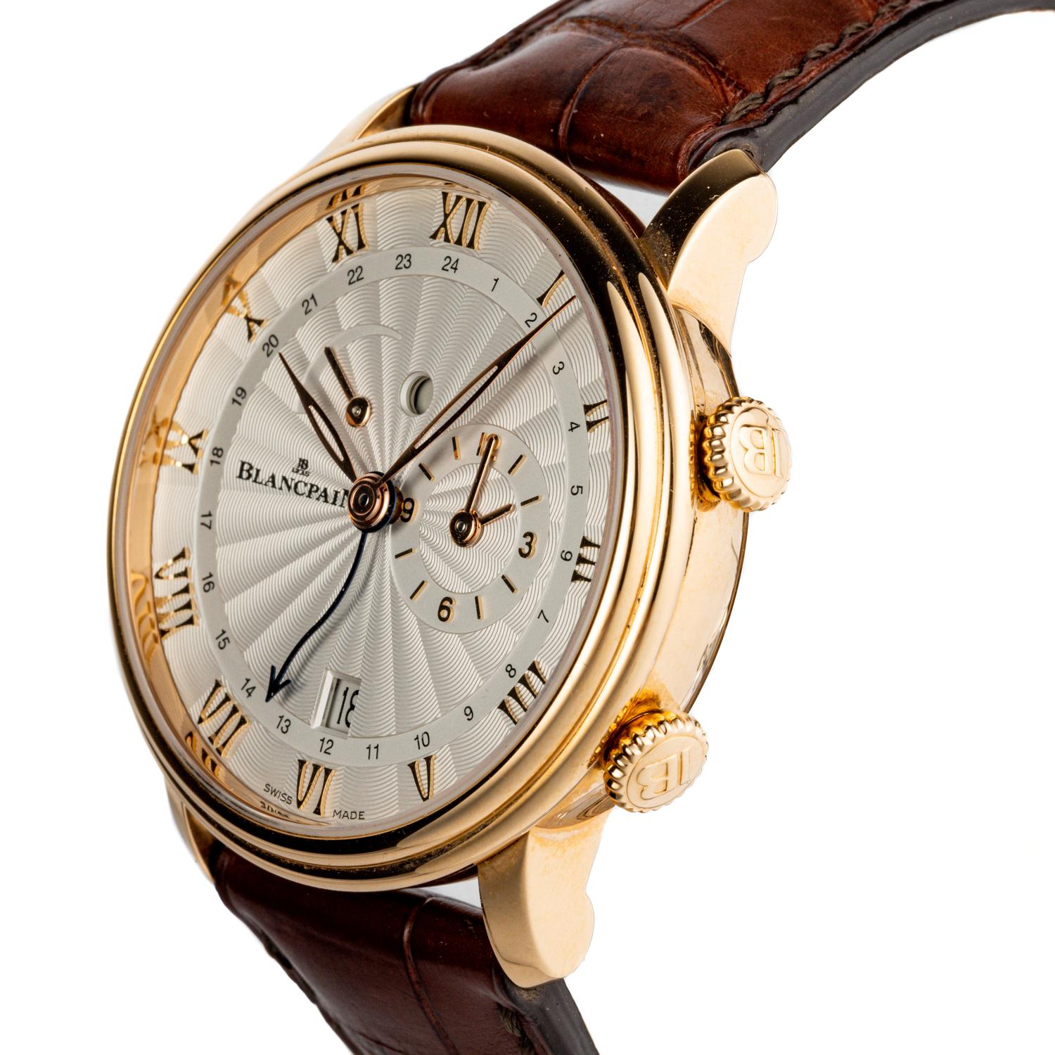 Entdecken Sie den Gipfel der Luxusuhrmacherei mit der Blancpain 18KRG Villeret Reveil GMT Uhr, Modell 6640-3642-55B. Als atemberaubende Verkörperung zeitloser Eleganz und präziser Handwerkskunst ist dieser Zeitmesser ein Zeugnis für das unermüdliche