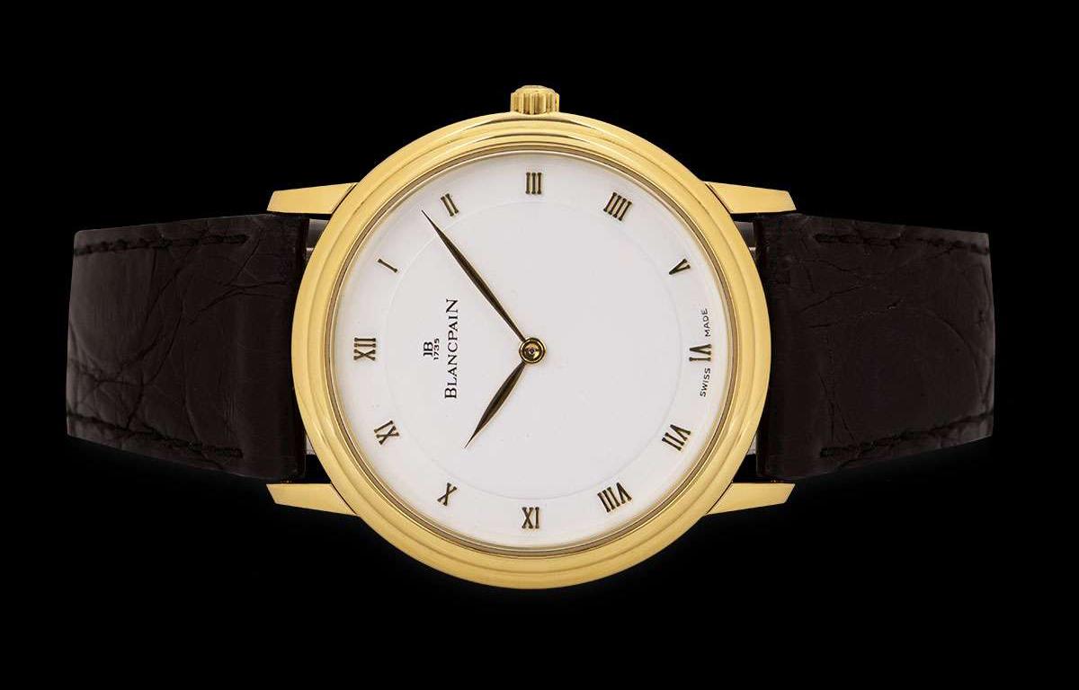 An 18k Yellow Gold Villeret Gents Wristwatch, white dial with roman numerals, a fixed 18k yellow gold bezel, a black leather strap with an original 18k yellow gold pin buckle, sapphire glass, exhibition caseback, automatic movement, in excellent