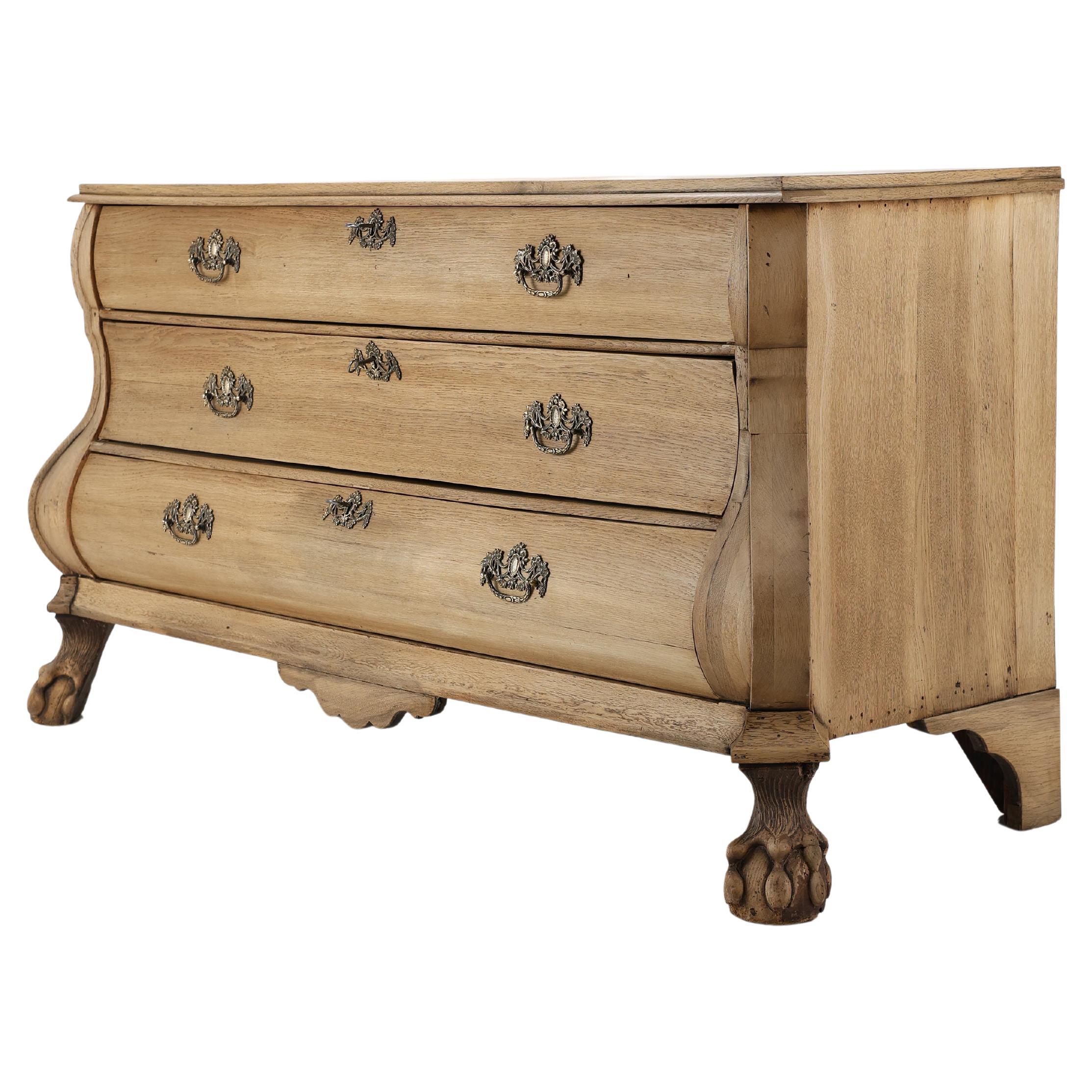 Bleached Dutch Baroque Chest of Drawers, 18th Century

An exquisite Baroque chest of drawers from the Netherlands, dating from the second half of the 18th century. Crafted from oak and carefully bleached to achieve a soft, light-toned finish that