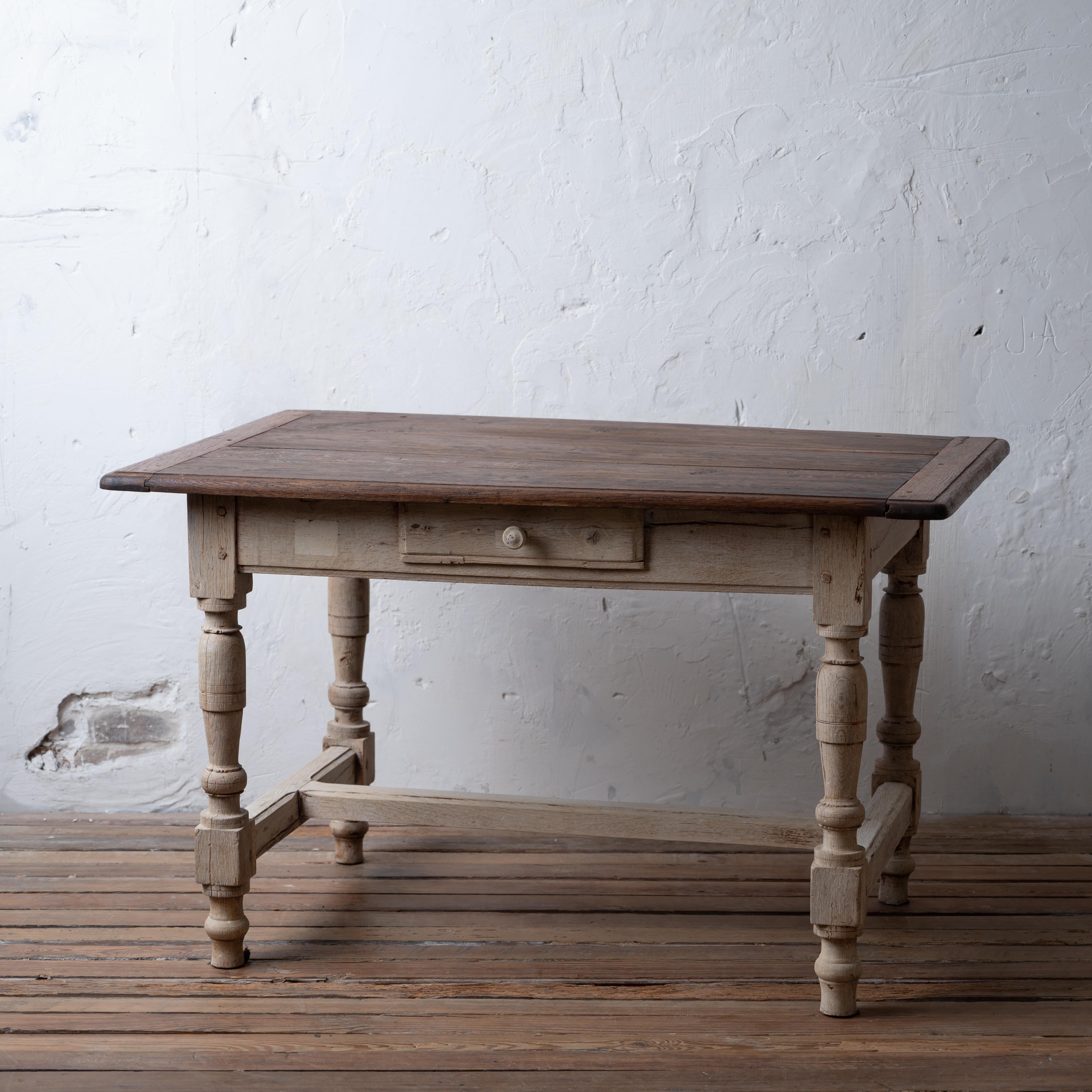 A bleached French chestnut kitchen side table, circa 1830.



47 ¼ inches wide by 31 ¾ inches deep by 29 inches tall; 

23 inches knee clearance





