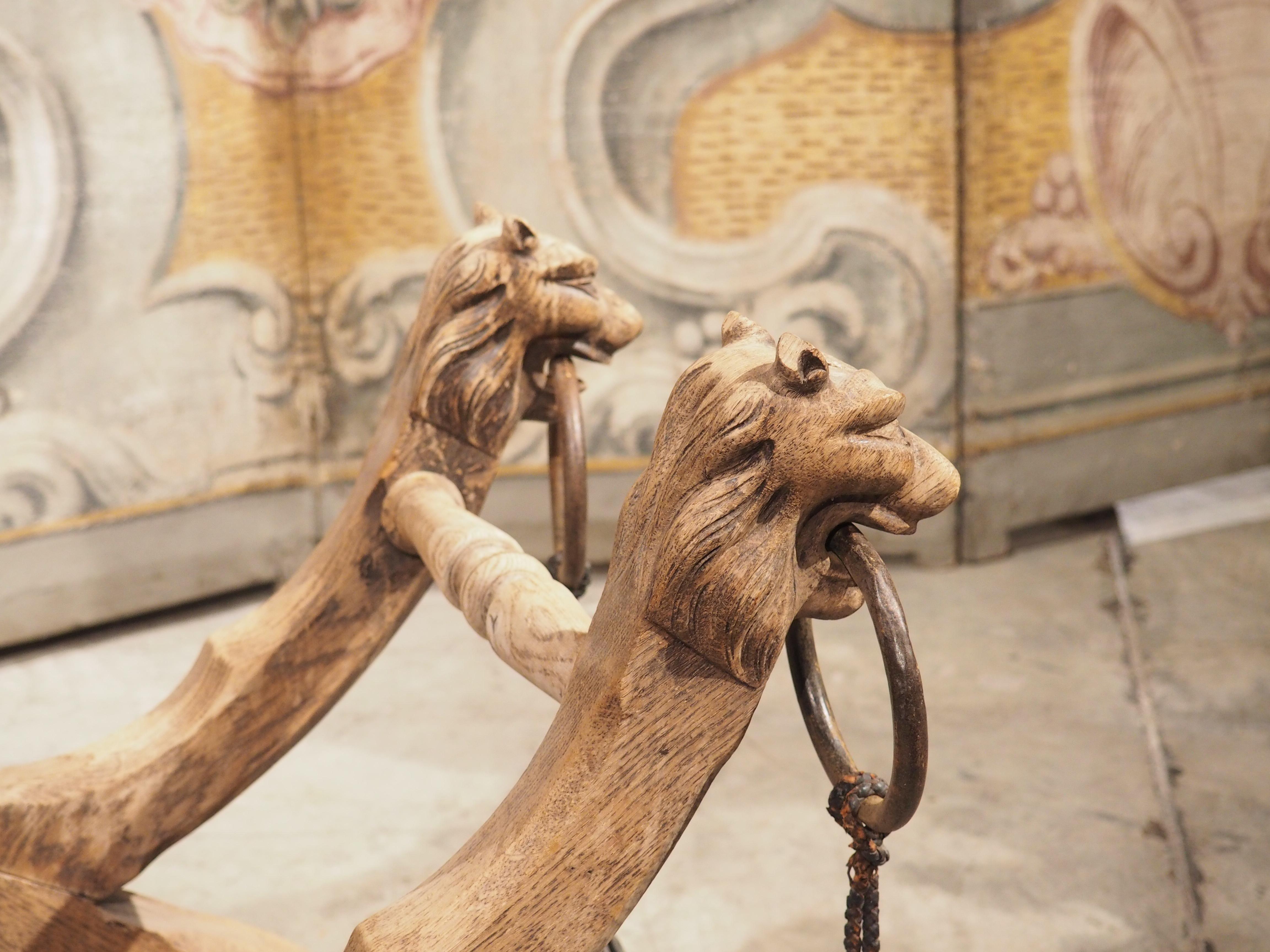 Bleached French Oak Curule Bench with Lion Heads and Iron Rings, Circa 1920 9