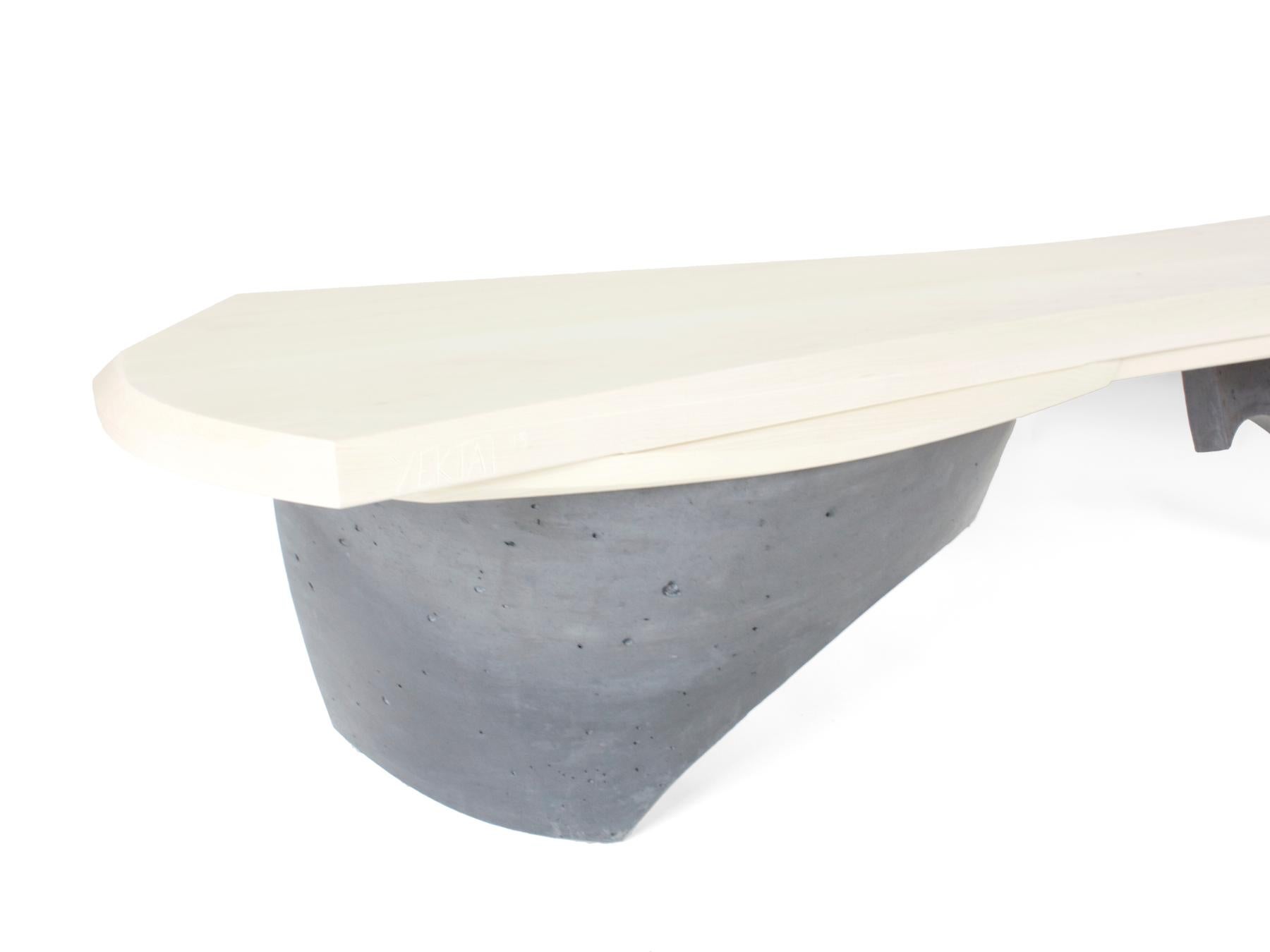 Presented in bleached maple and charcoal colored cast concrete. This version is smaller than its bigger sibling but not a small bench by any means. This version measures 72” long and the castings could easily accommodate a seat a bit shorter and