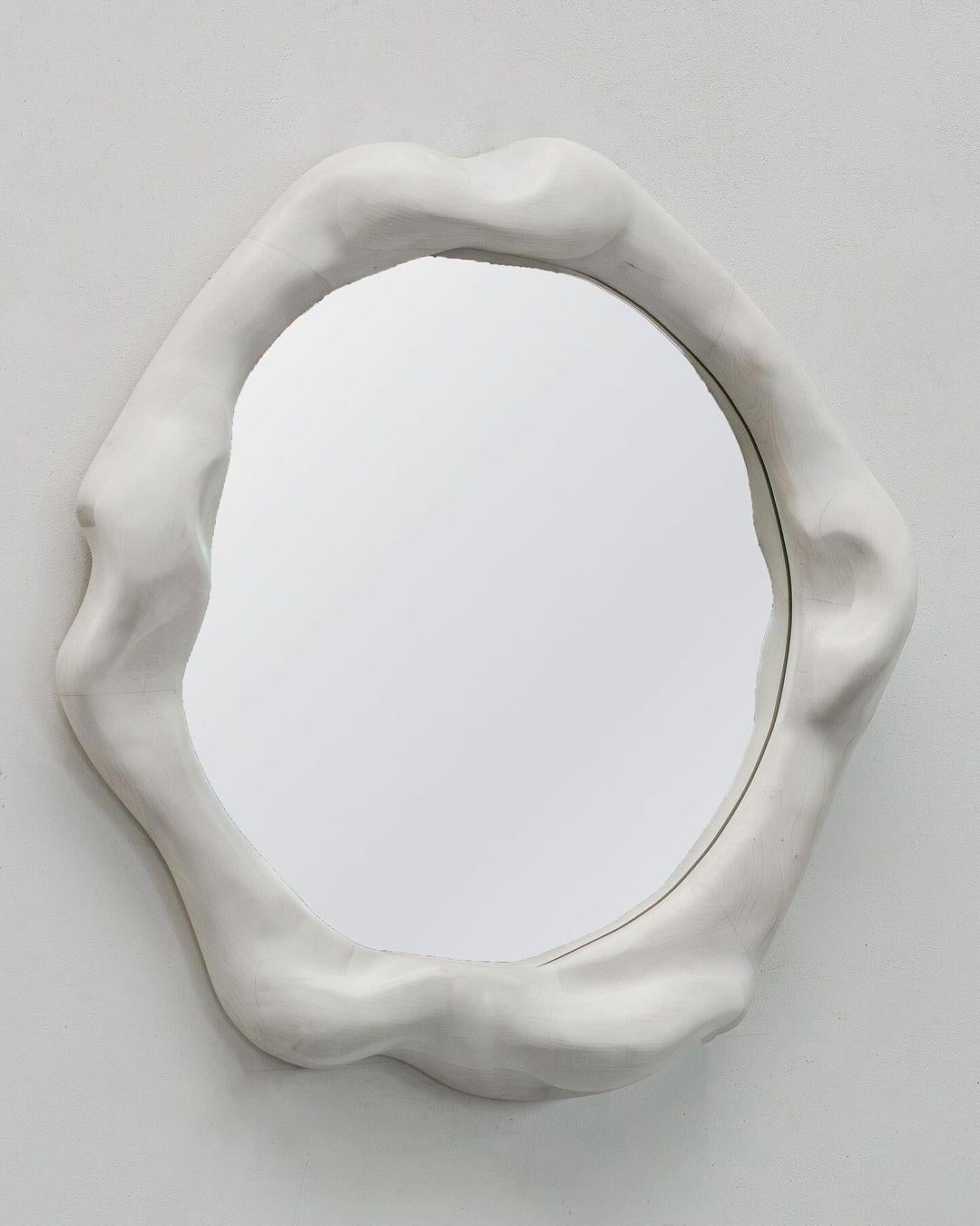Bleached Maple Mirror by Alexander Knysch
Dimensions: W 95 x H 95 cm.
Materials: Maple.

Alexander was born in kazakhstan in 1990 and moved to germany at the age of 4, where he grew up near stuttgart with his parents and two siblings. Influenced by