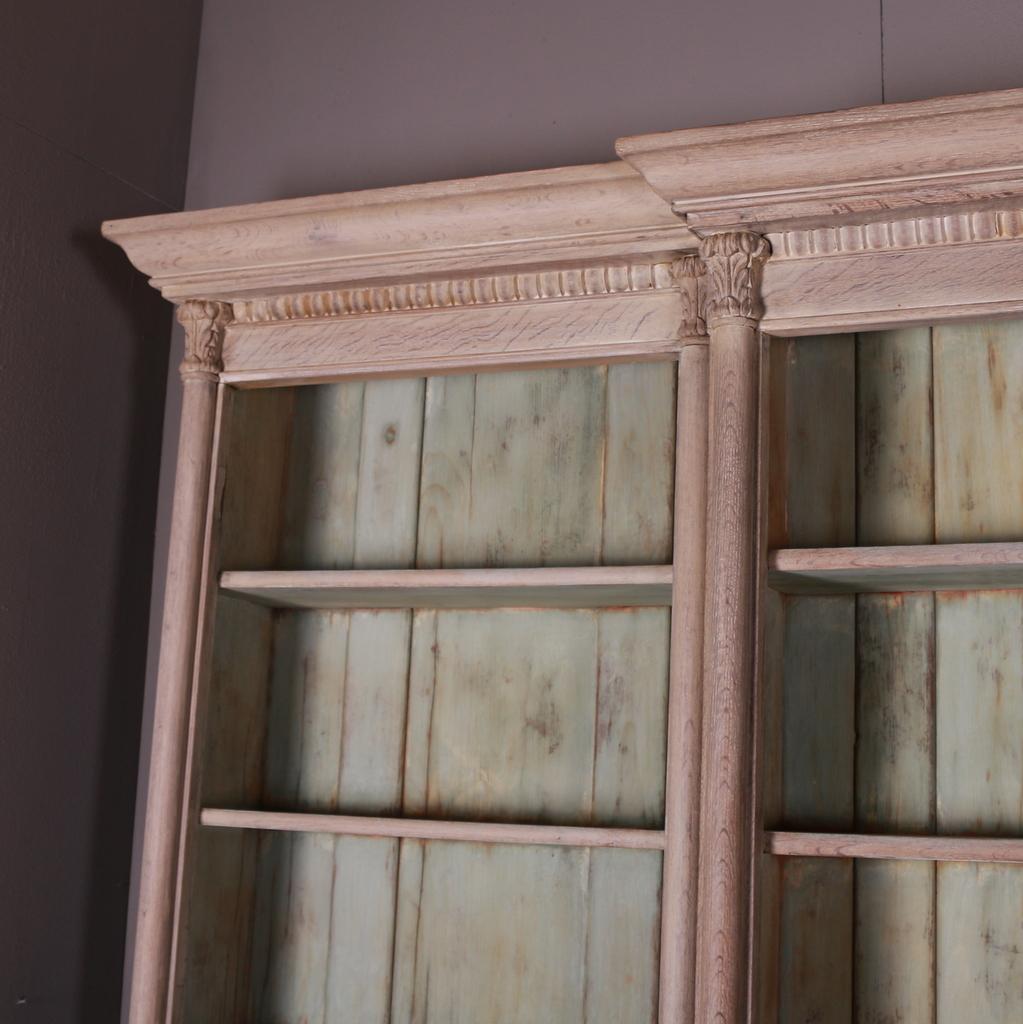 Stunning early 19th C bleached oak breakfront library bookcase. 1810.

Dismantles into six pieces for delivery.

Dimensions
143 inches (363 cms) wide
17.5 inches (44 cms) deep
89 inches (226 cms) high.