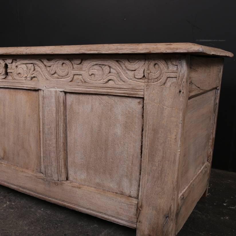 Late 17th century bleached carved oak coffer, 1690.

Dimensions:
44 inches (112 cms) wide
18.5 inches (47 cms) deep
20.5 inches (52 cms) high.

 